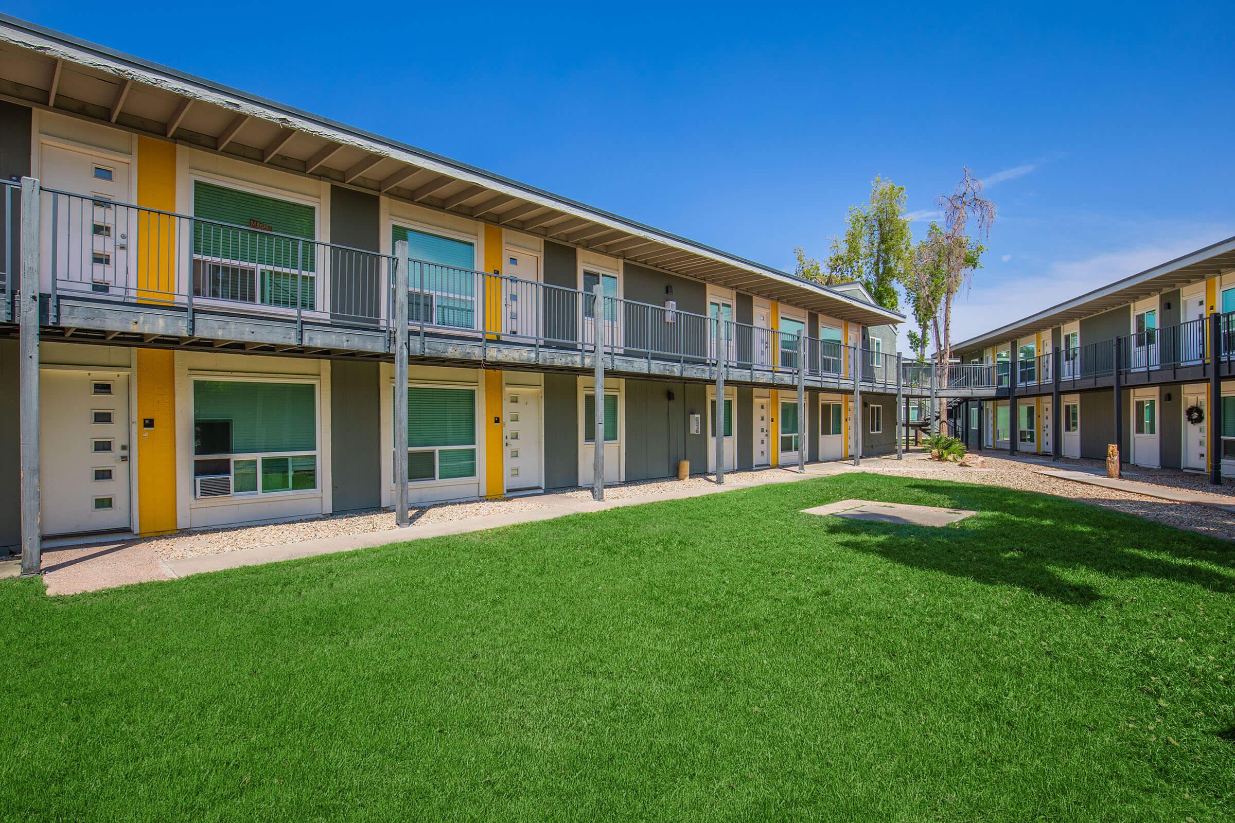 a large lawn in front of a house