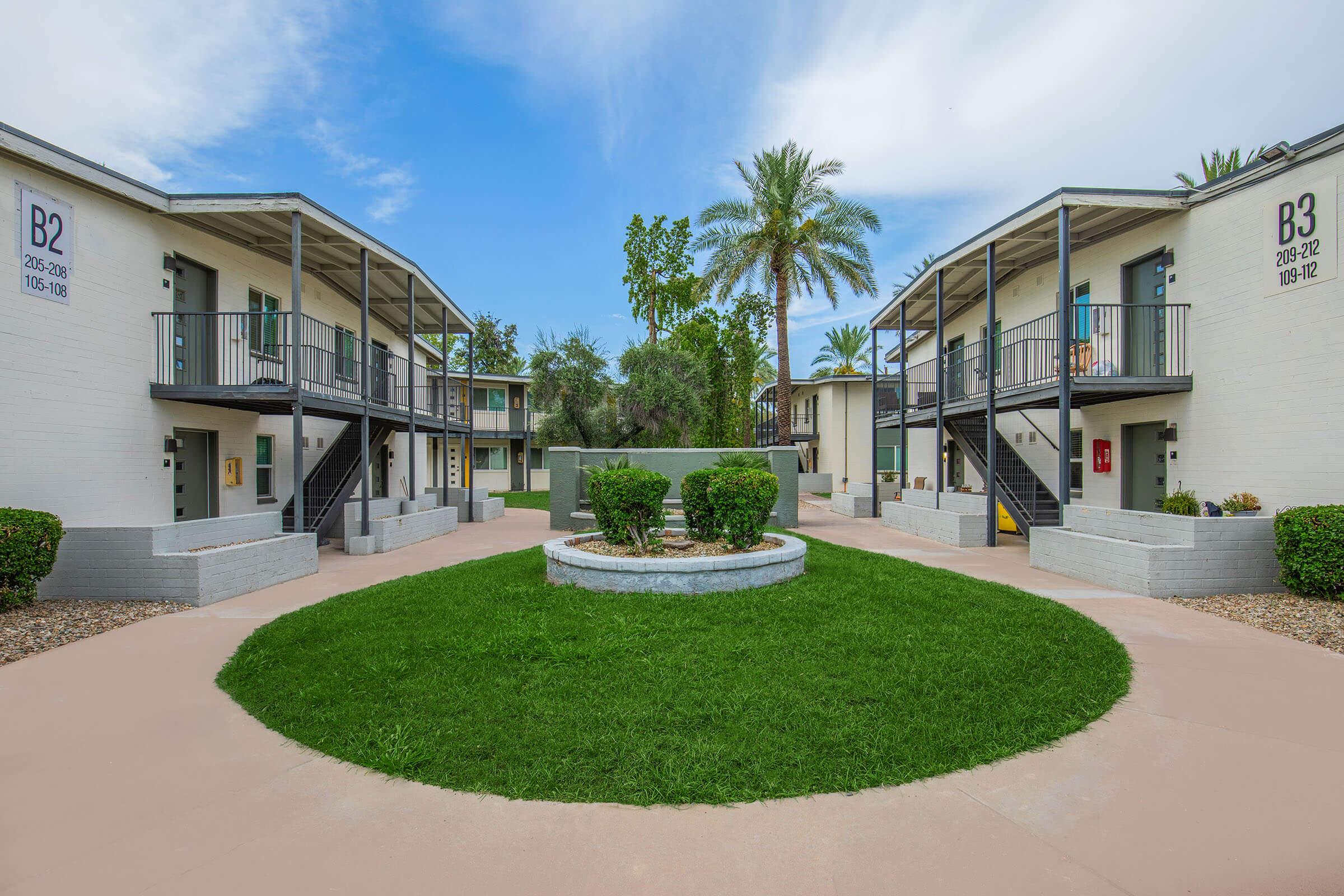 a large lawn in front of a house