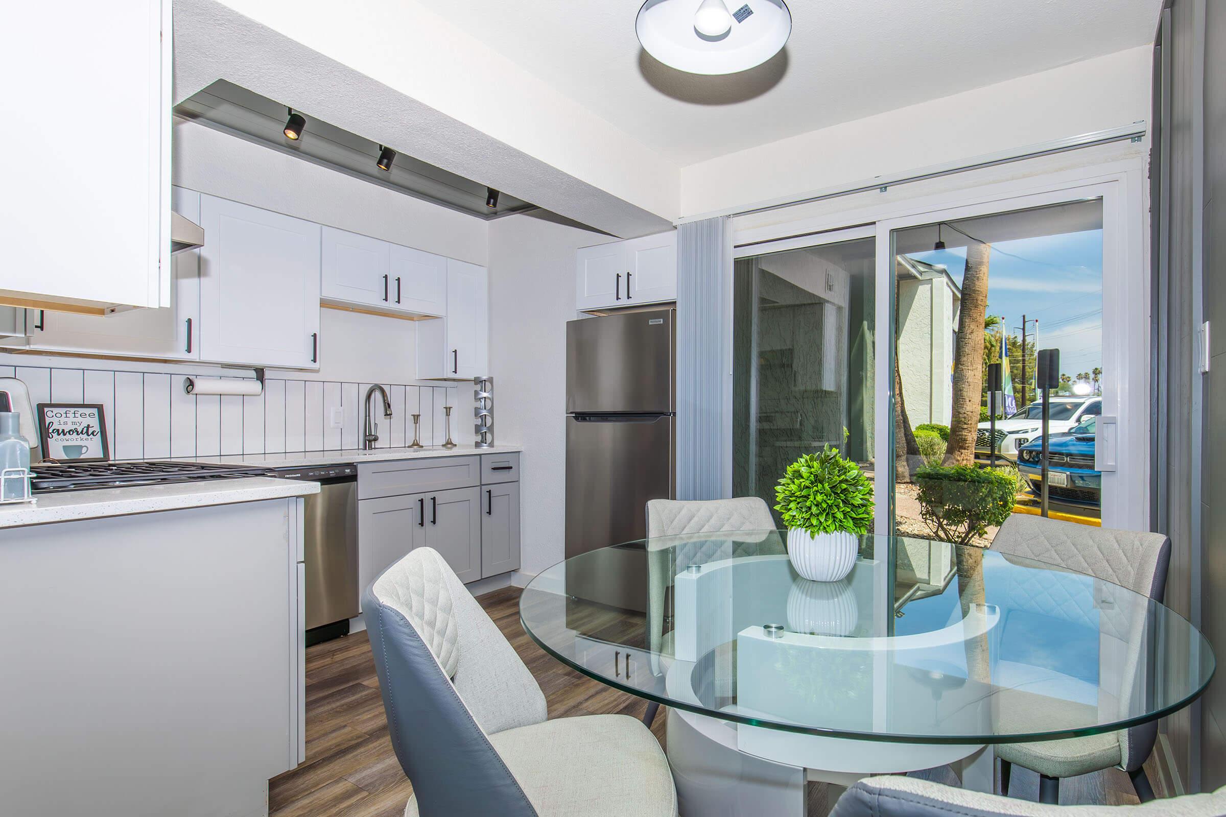 a kitchen with an island in the middle of a room