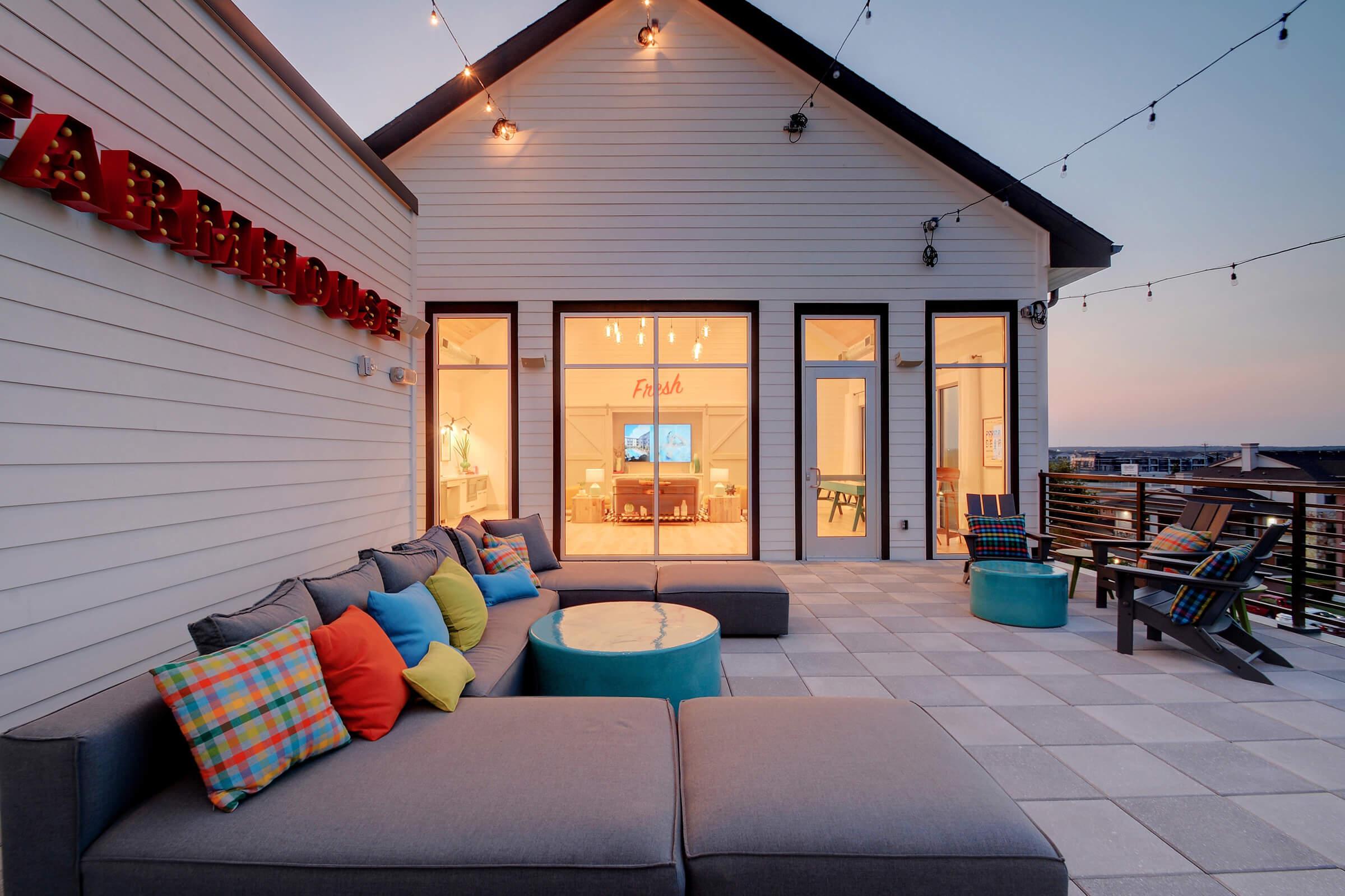 a living area with a building in the background