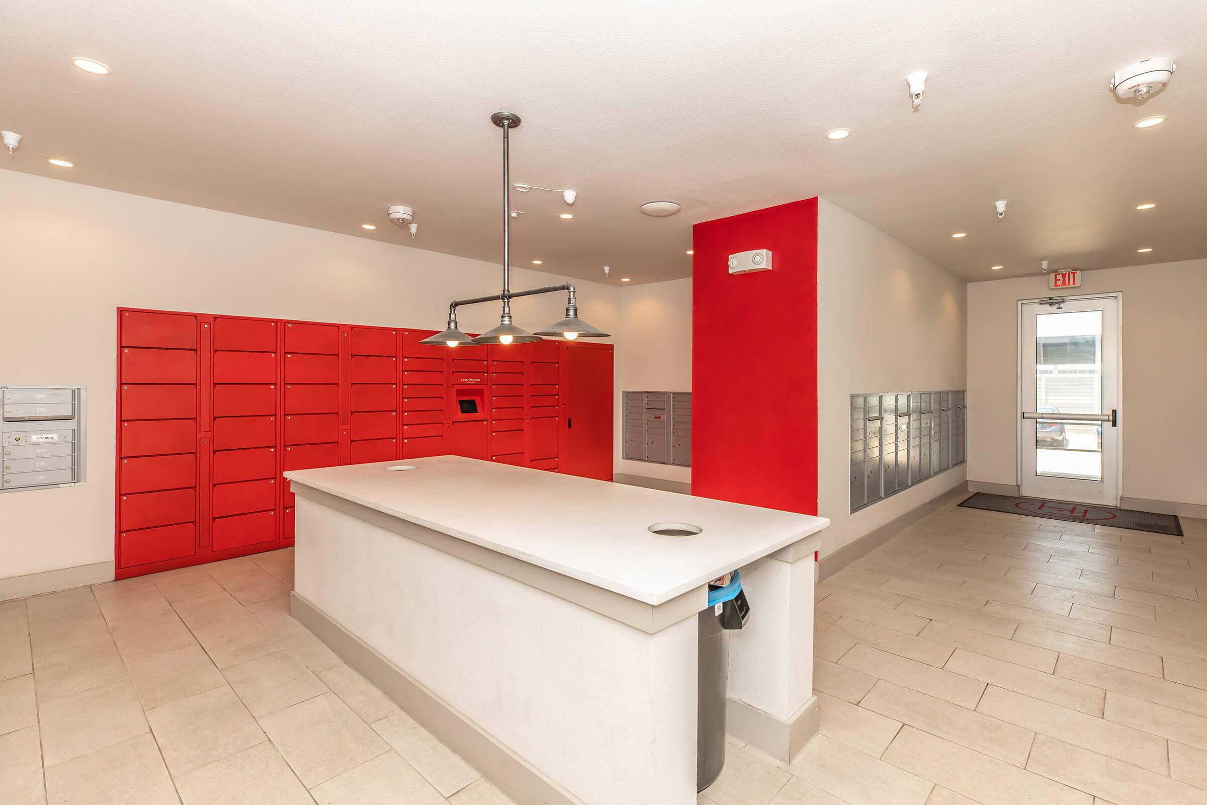 a kitchen with red floor