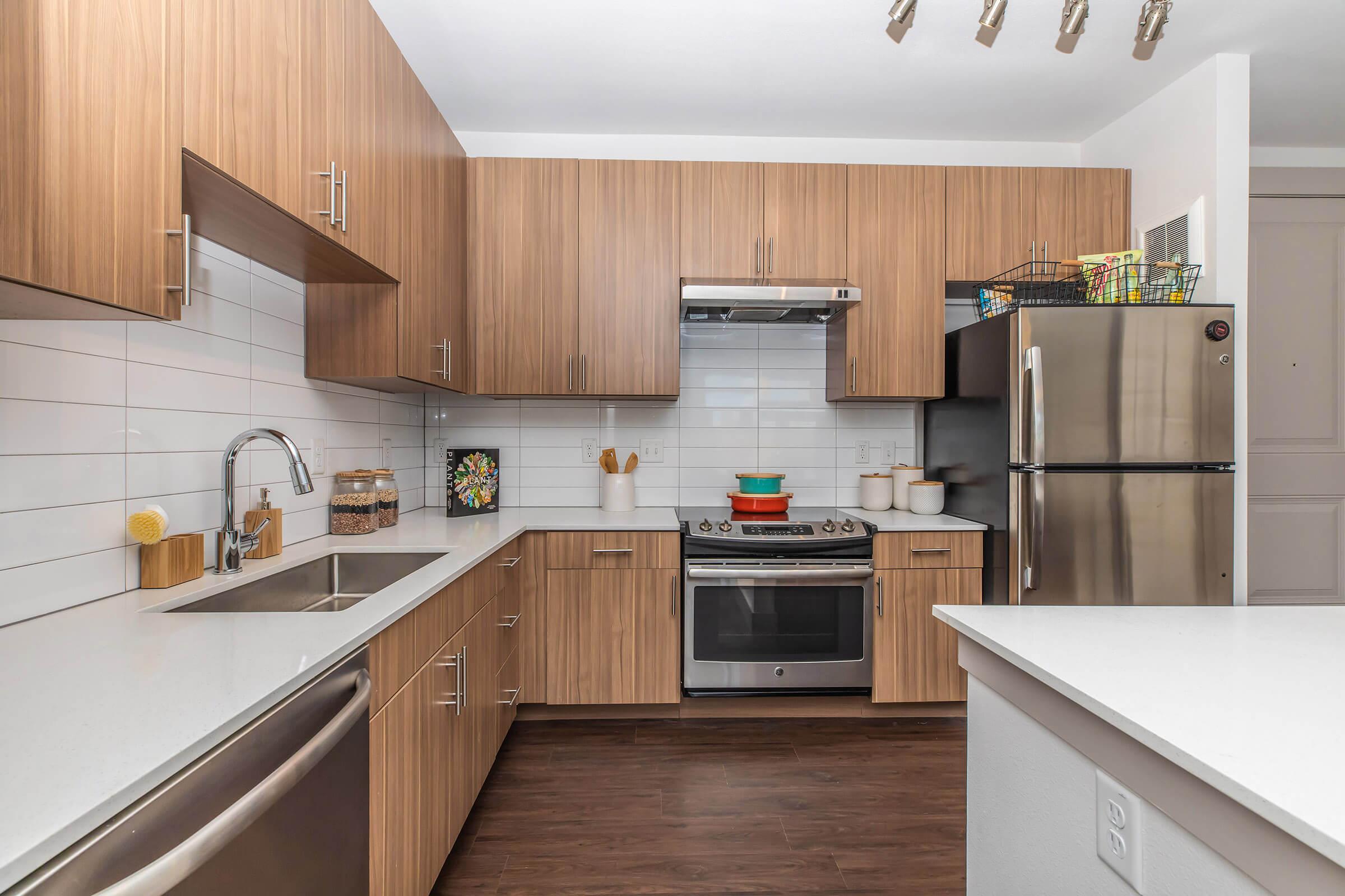 a kitchen with stainless steel appliances