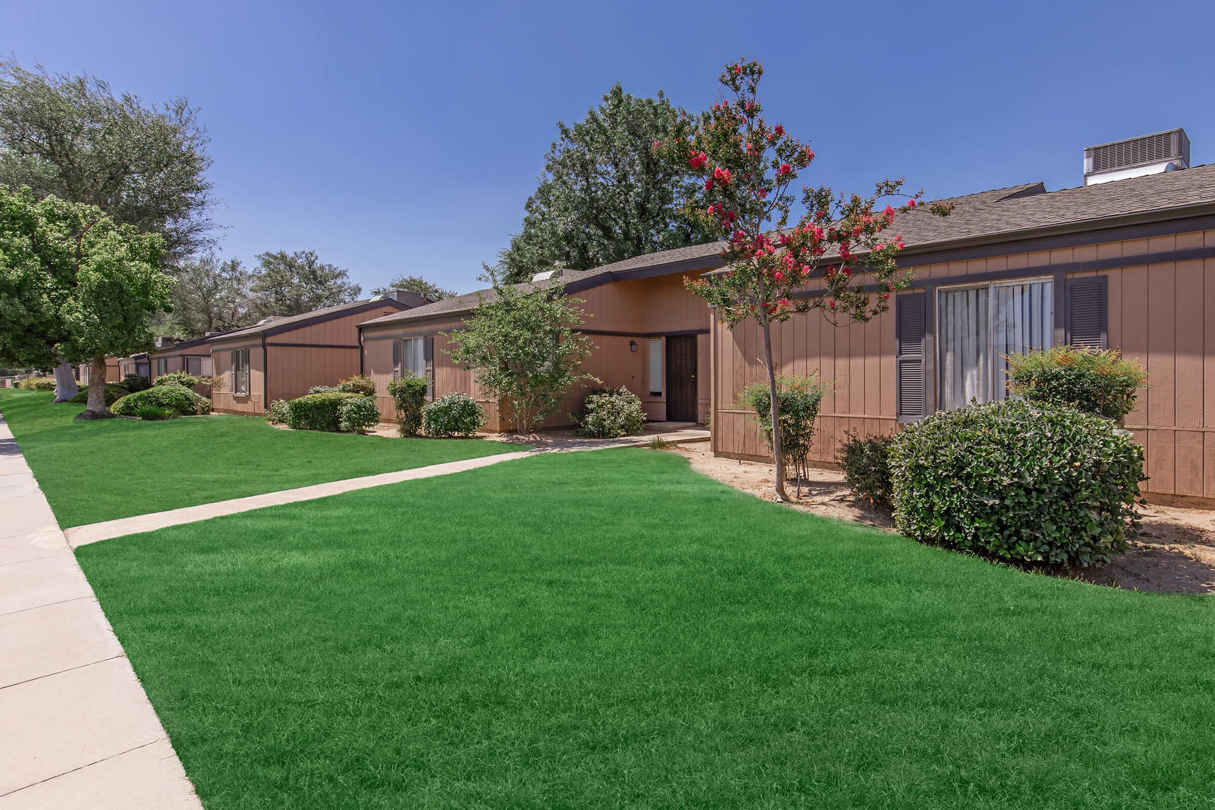 a large lawn in front of a house