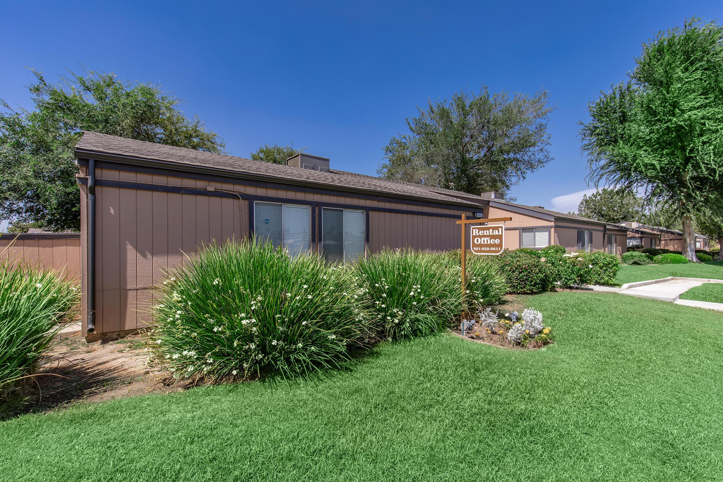 a large lawn in front of a house