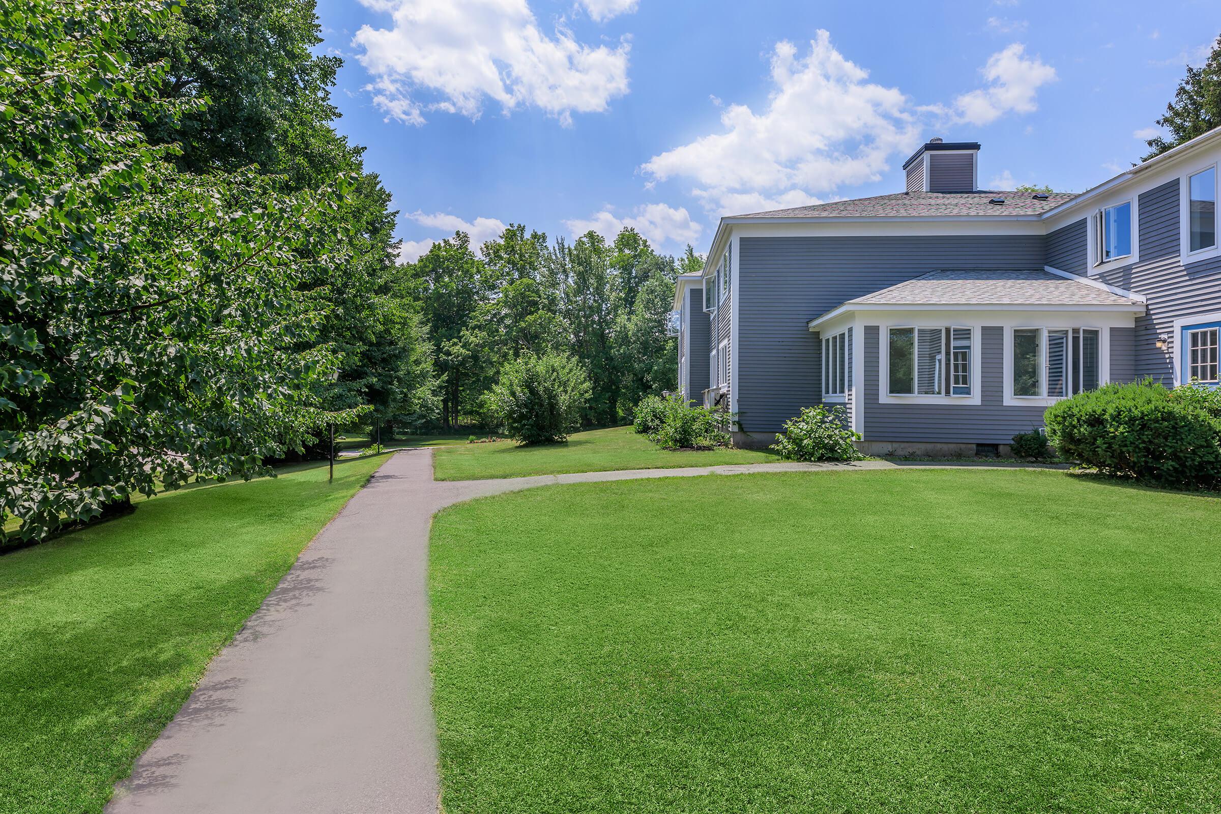 a large lawn in front of a building