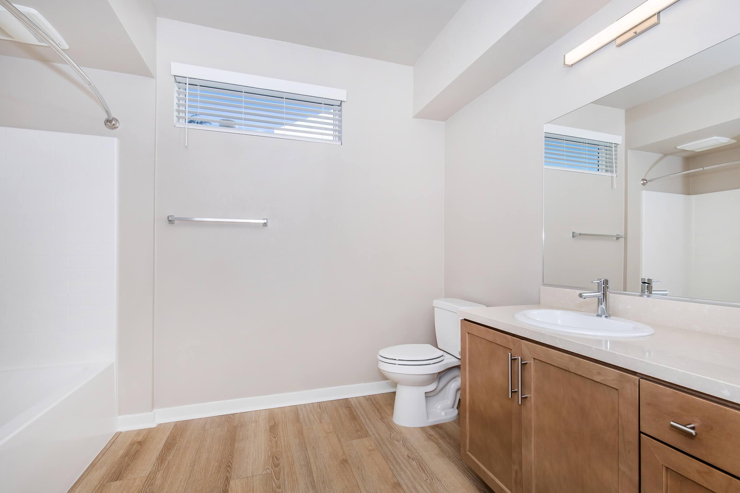 a room with a sink and a shower