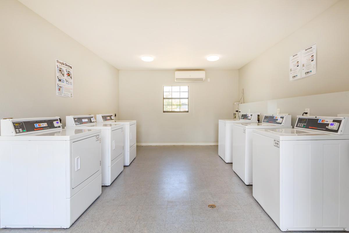 a large white refrigerator in a kitchen