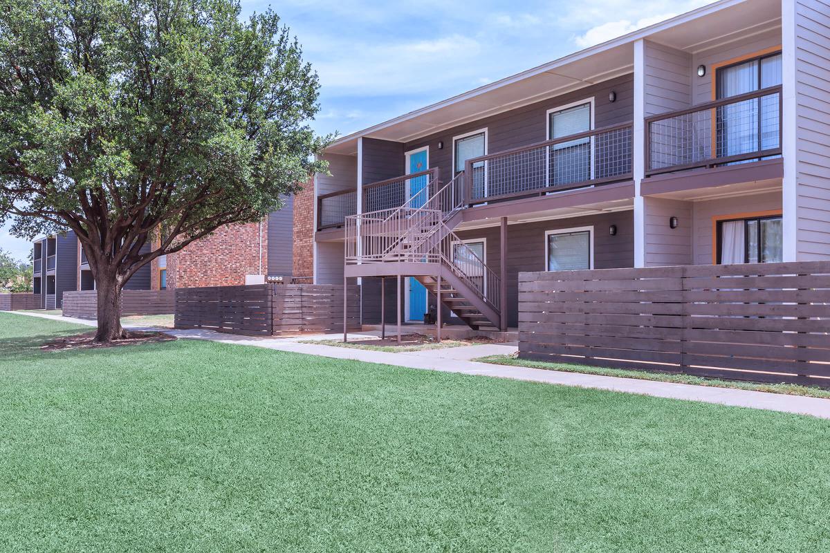 a large lawn in front of a building