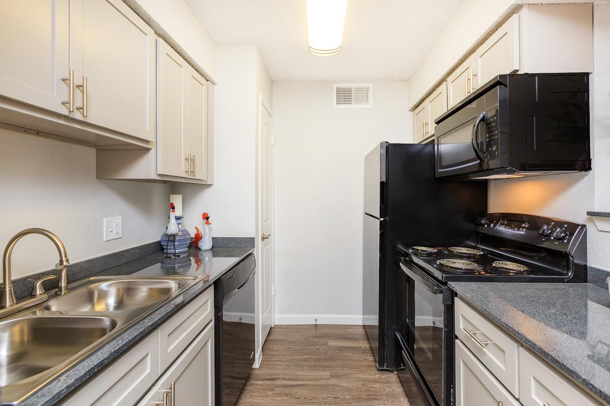 a modern kitchen with stainless steel appliances