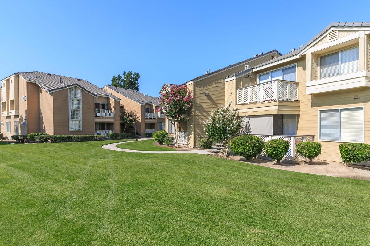 a large lawn in front of a house