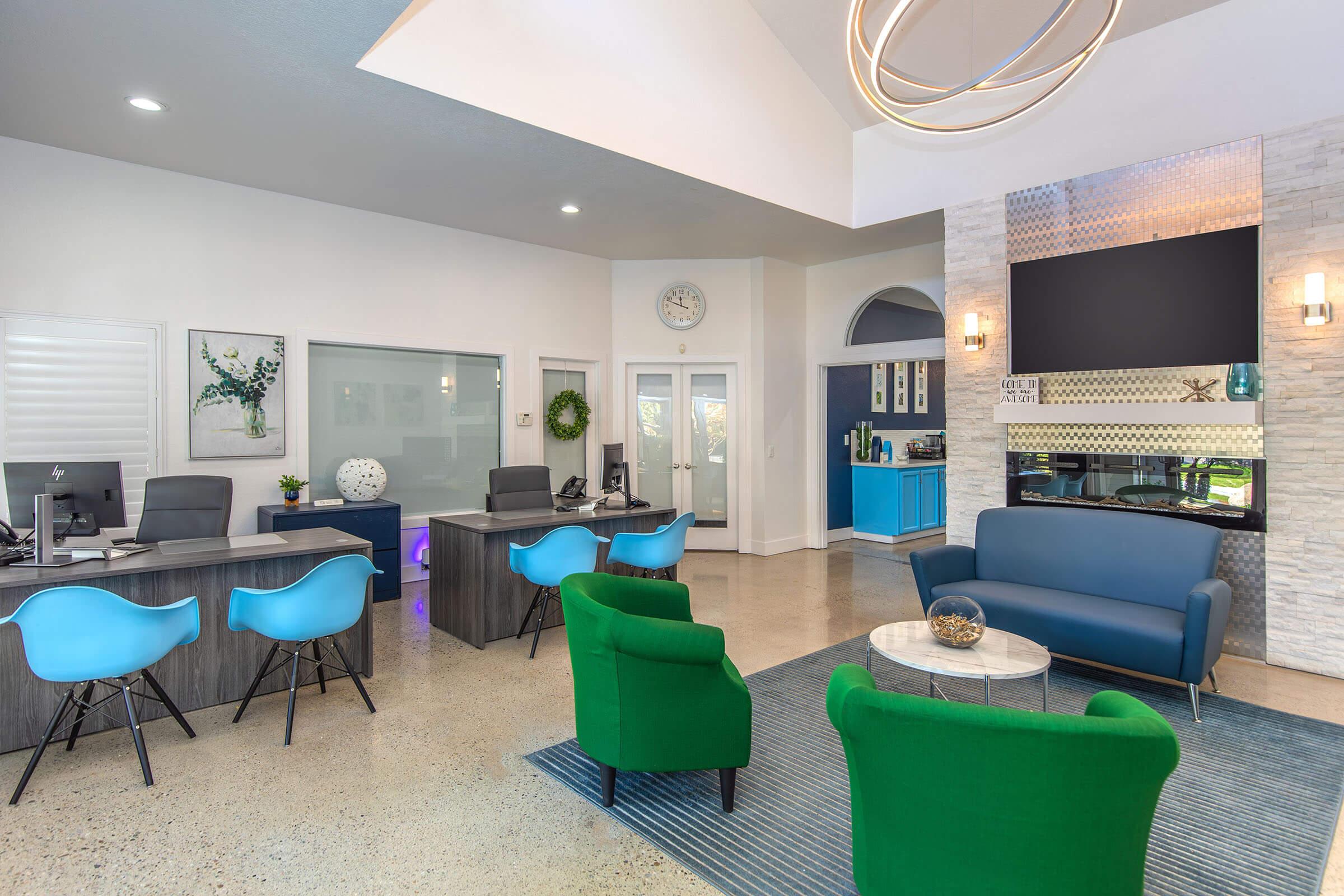 a living room filled with furniture and a flat screen tv