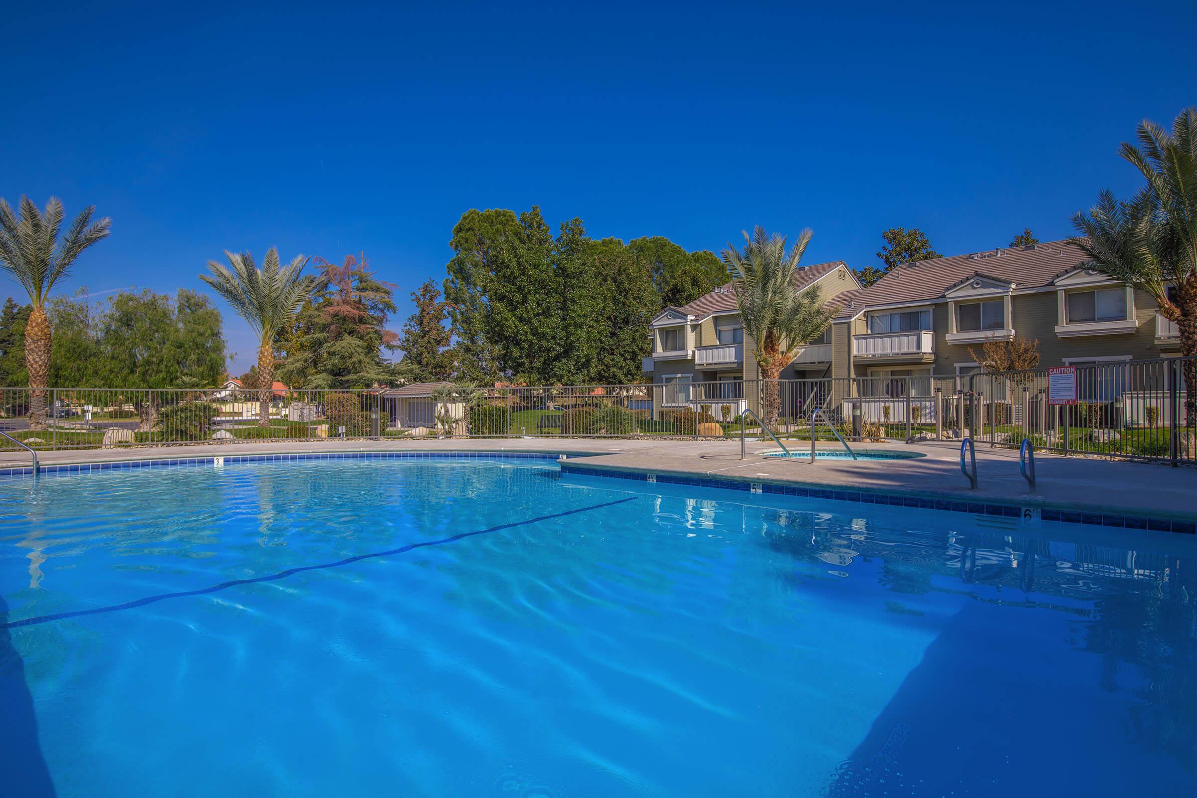 a pool next to a body of water