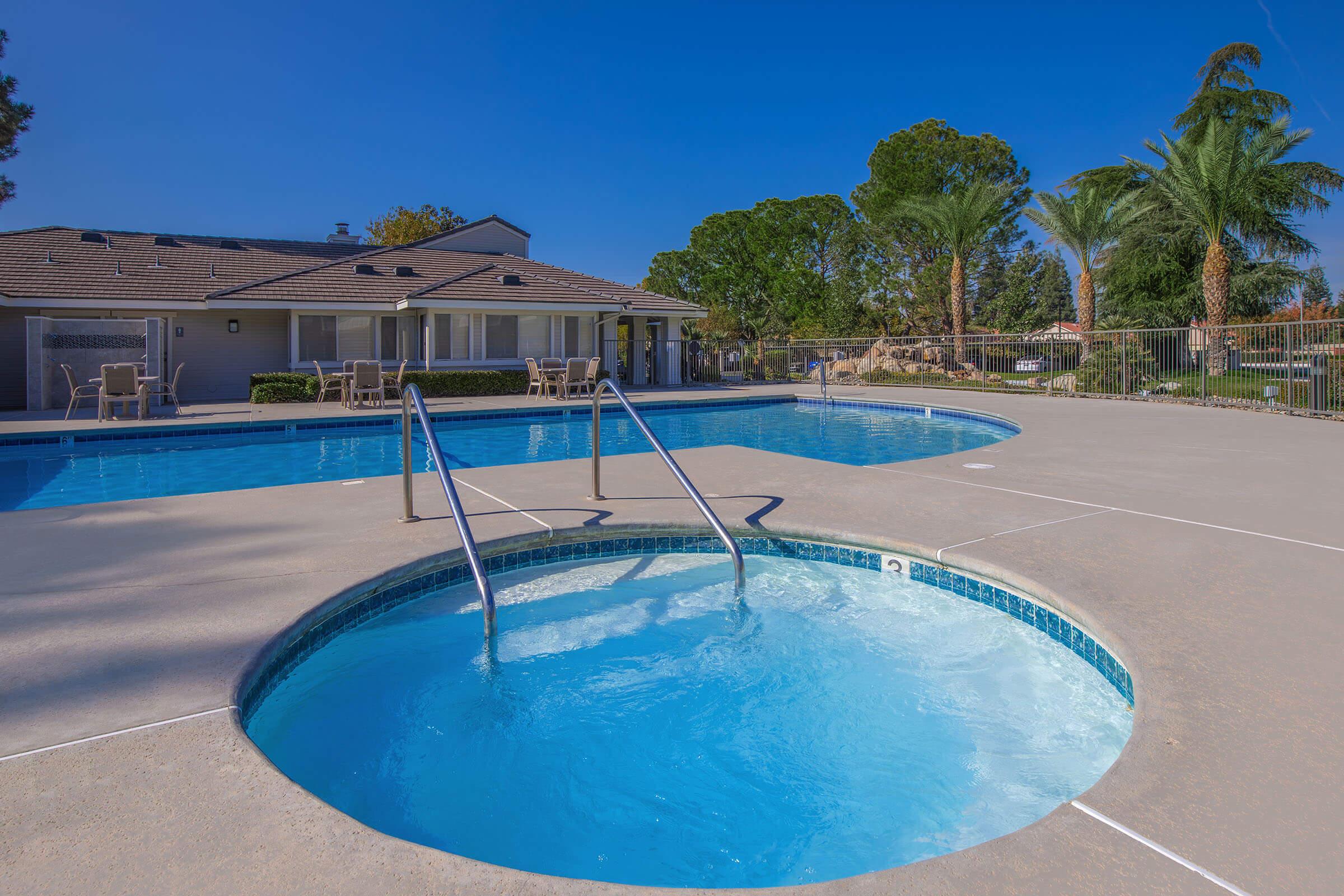 a pool next to a body of water