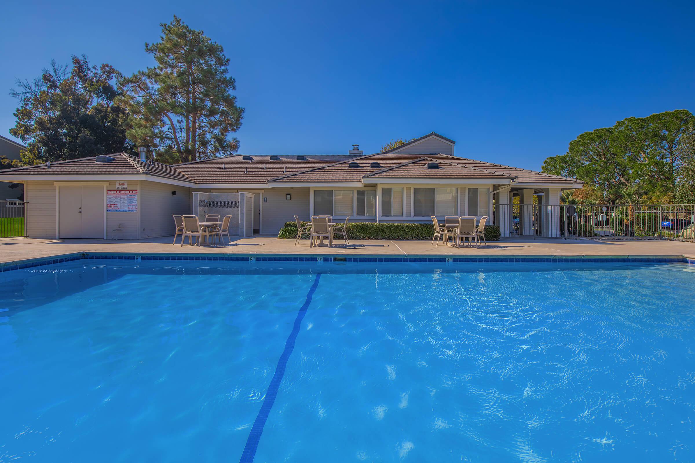 a pool next to a body of water