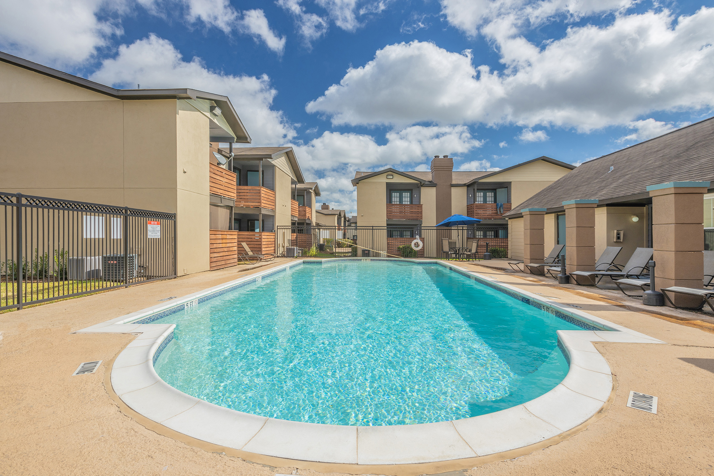 a pool next to a building