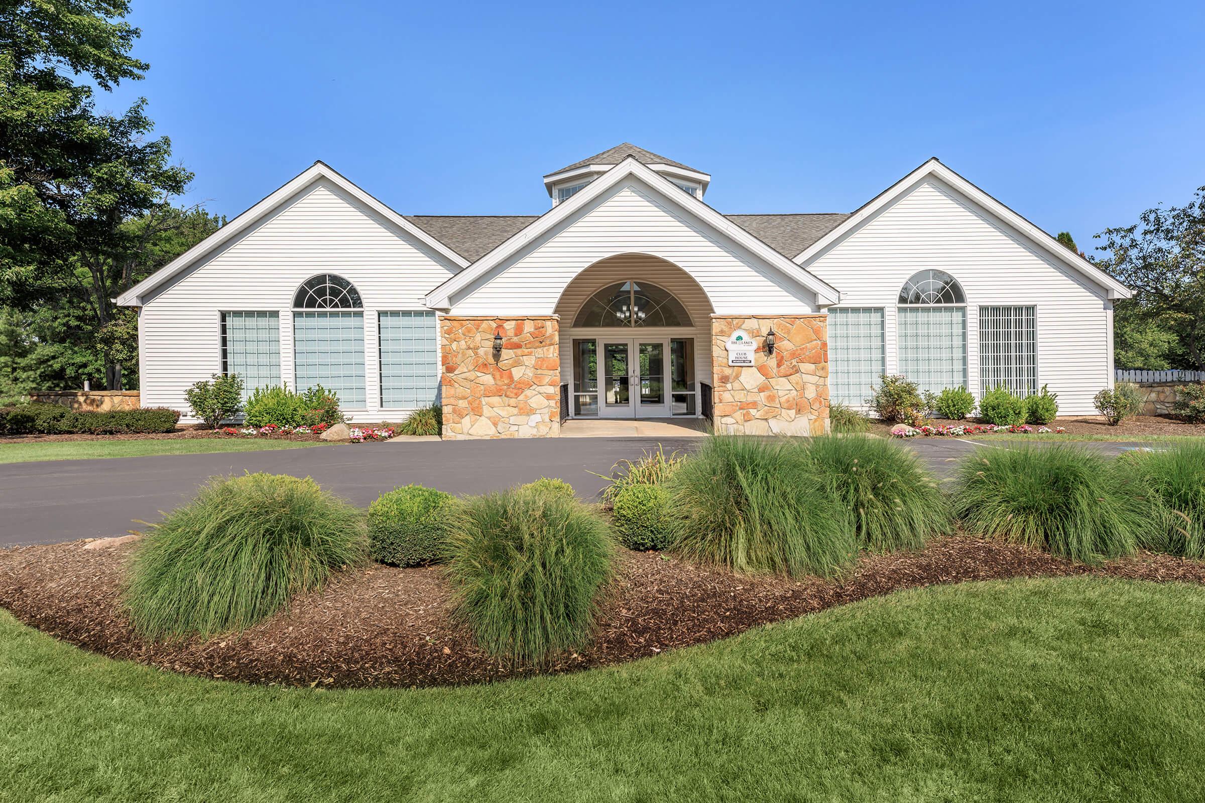 a large lawn in front of a house