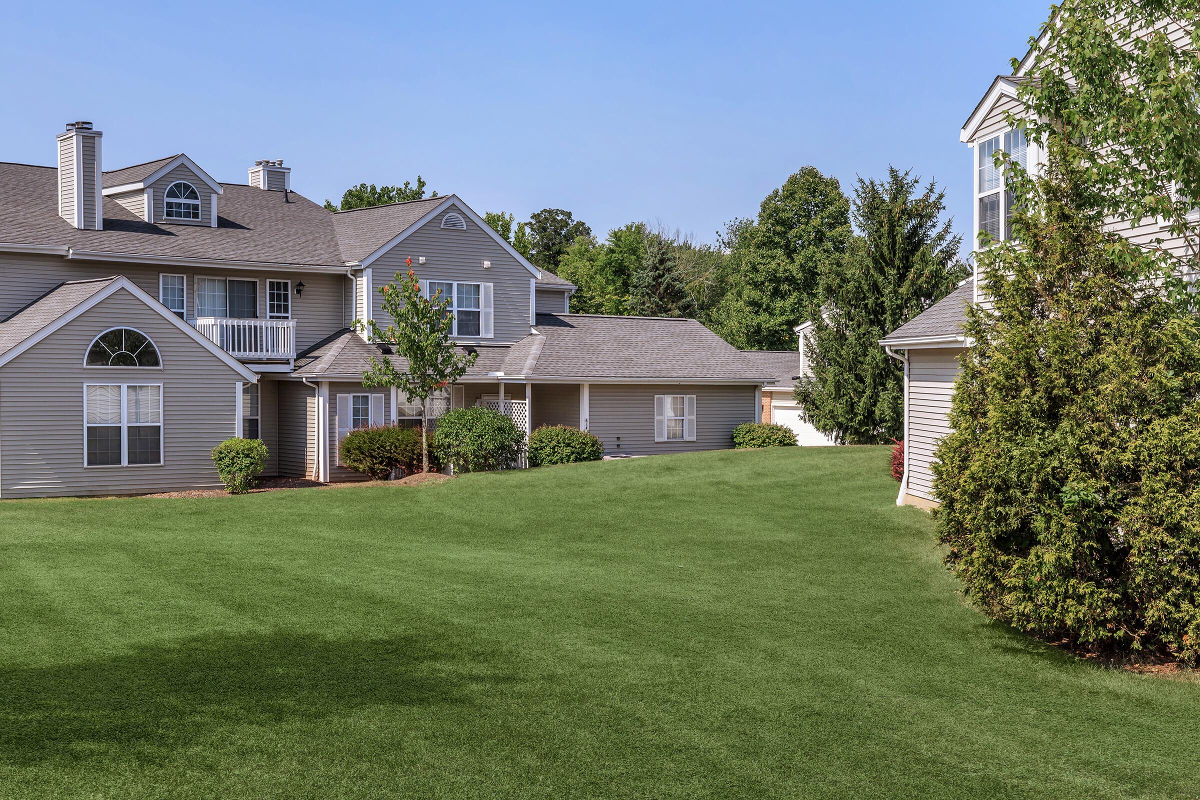 a large lawn in front of a house