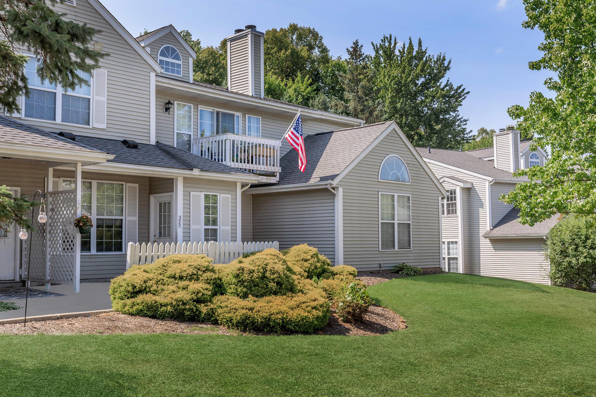 a large lawn in front of a house