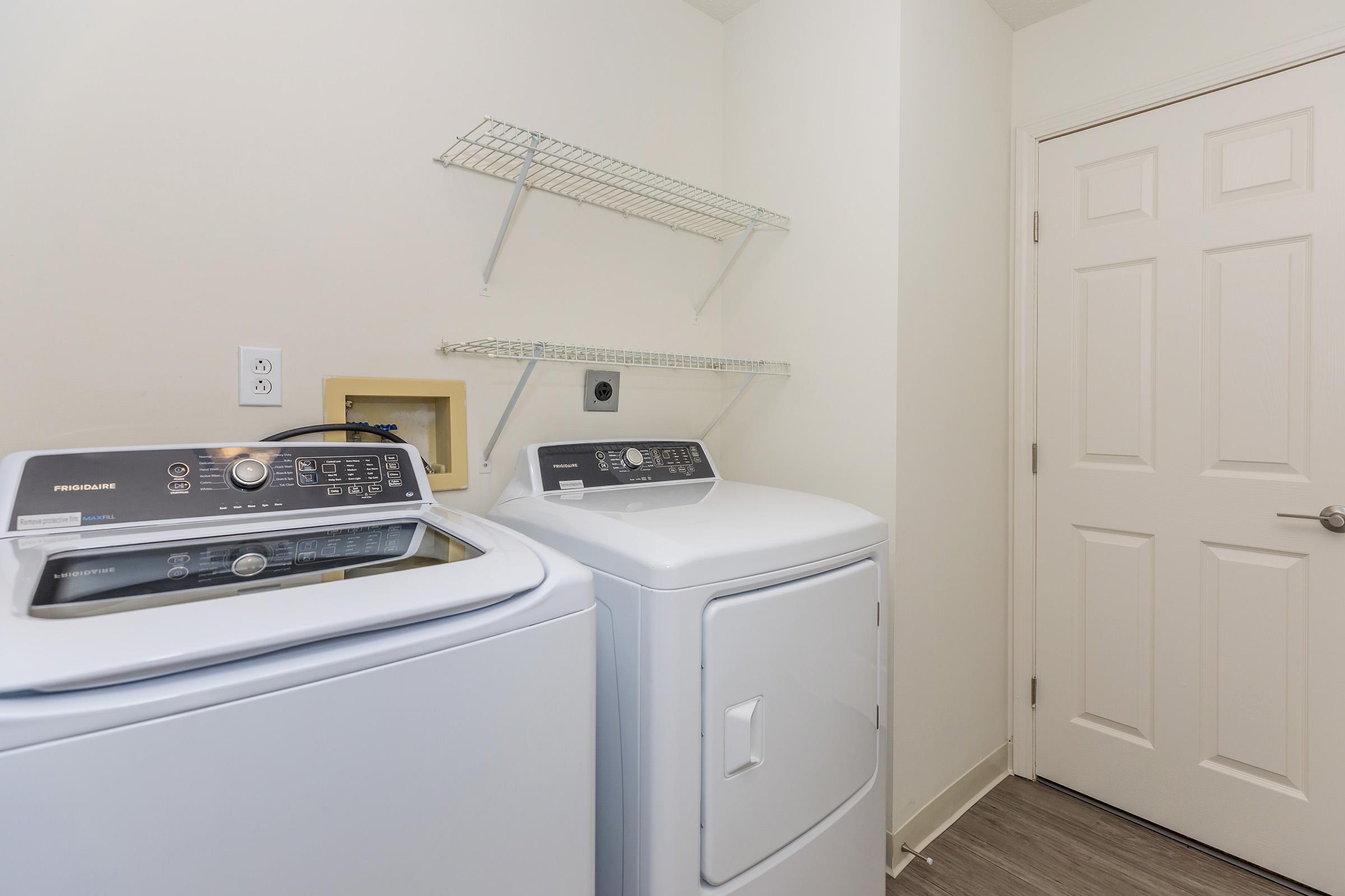 a stove top oven sitting inside of a kitchen