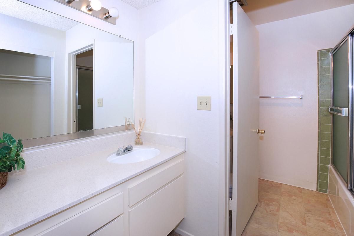Unfurnished bathroom with sliding glass shower door
