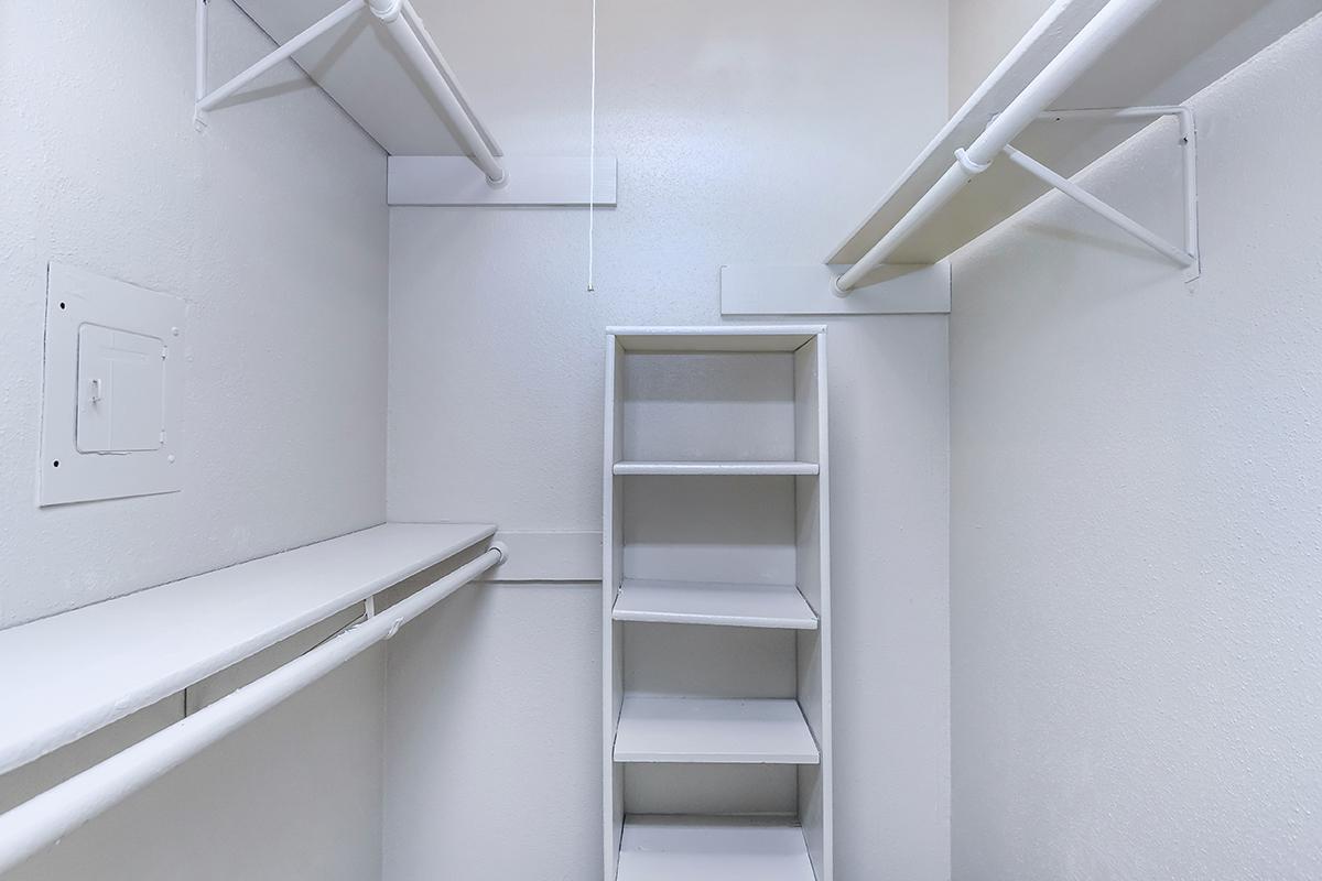 a white refrigerator freezer sitting in a room