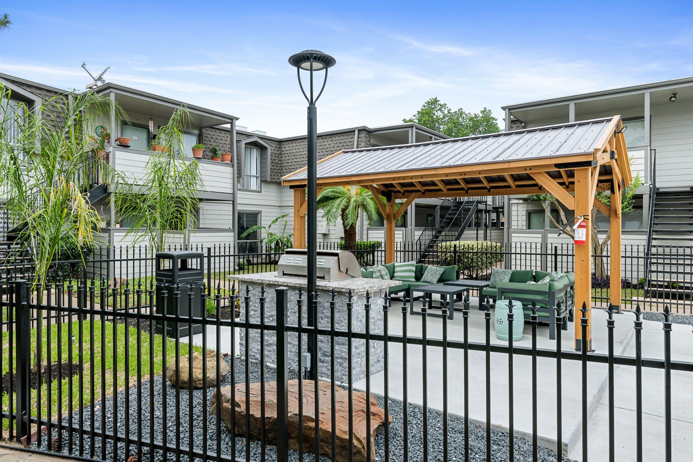 a building with a metal fence
