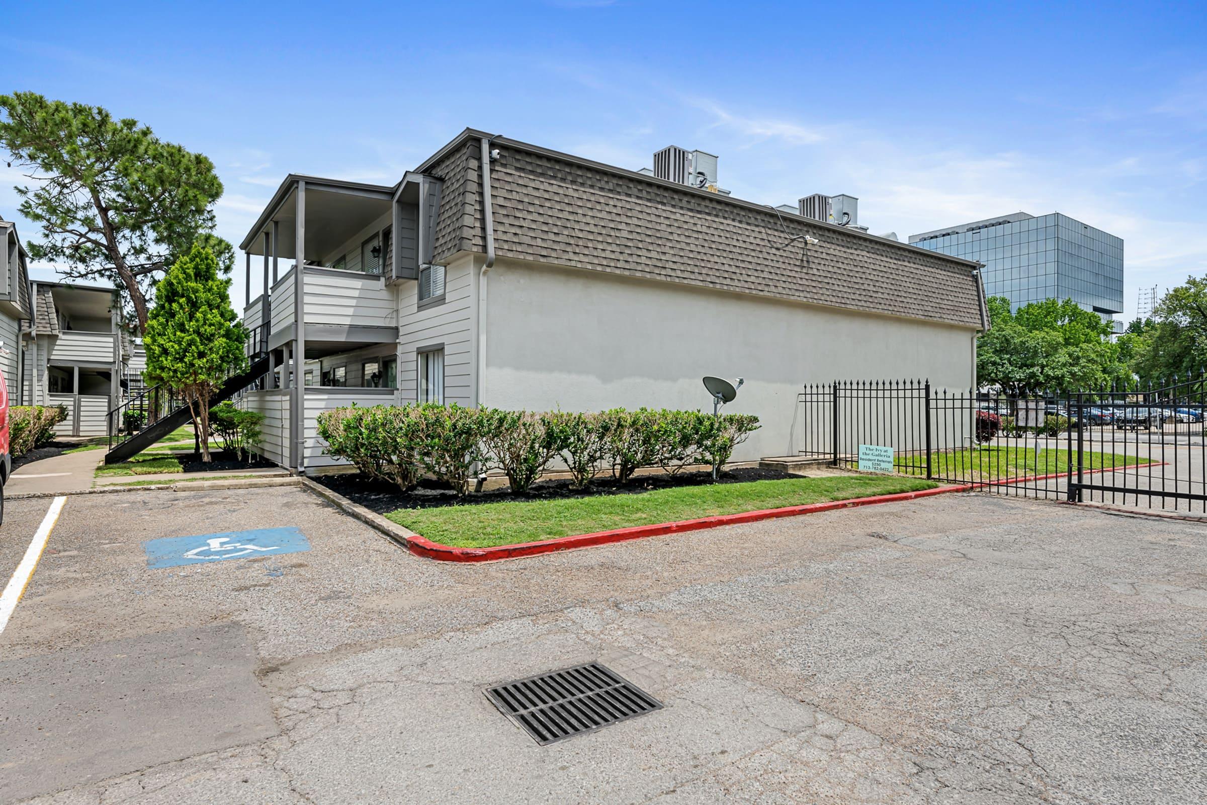 a small house in a parking lot