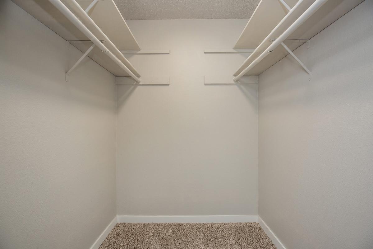 a white tub sitting next to a door
