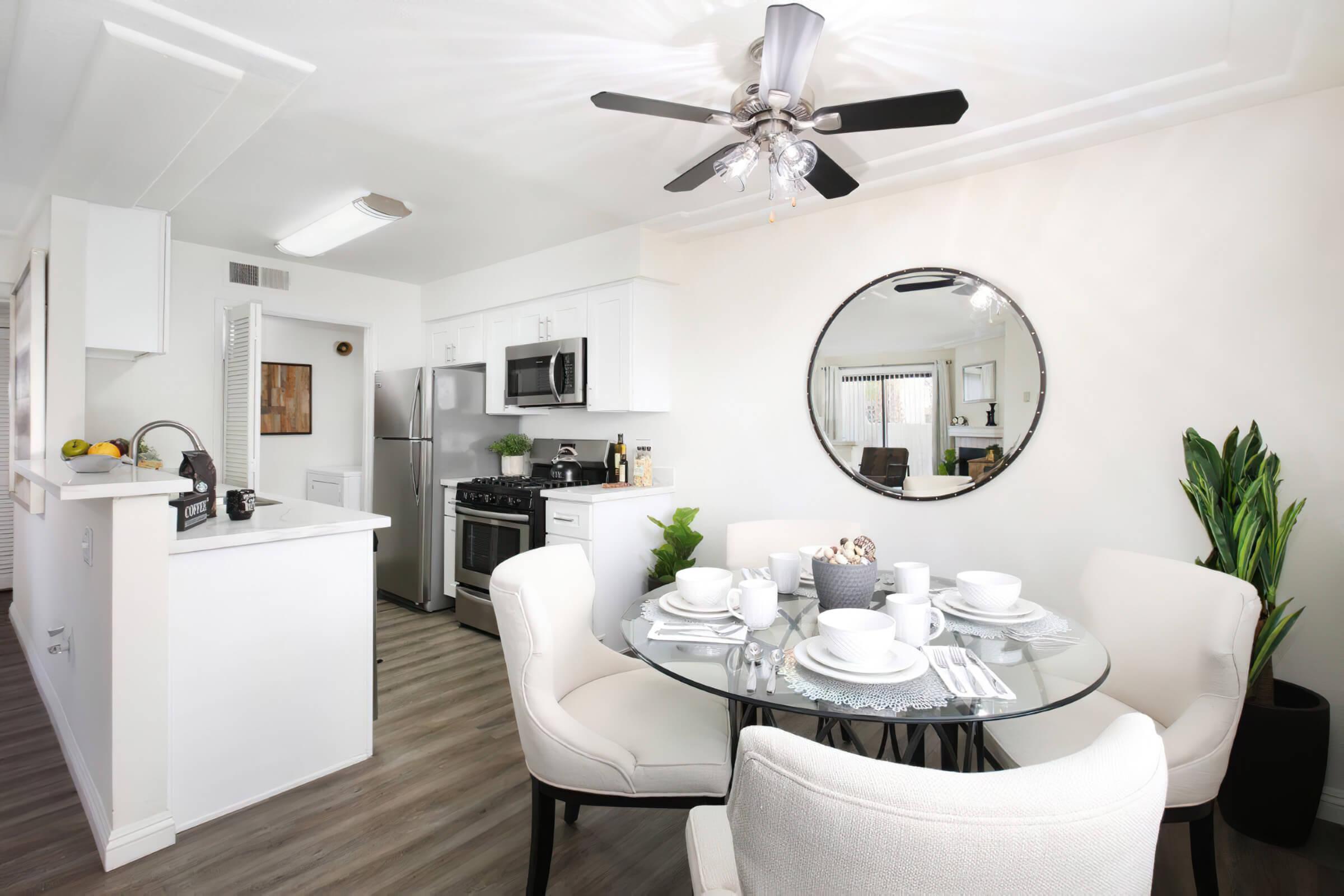 a kitchen with a table in a room