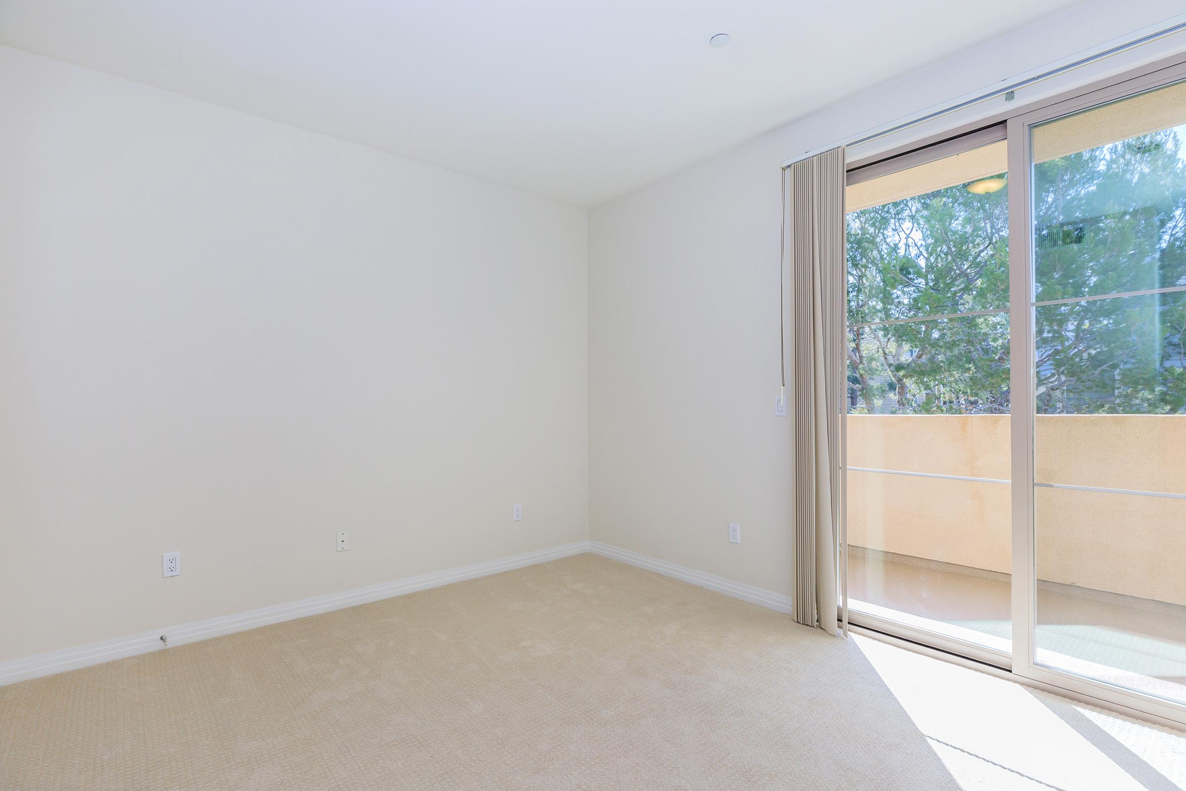 Bedroom with sliding glass doors