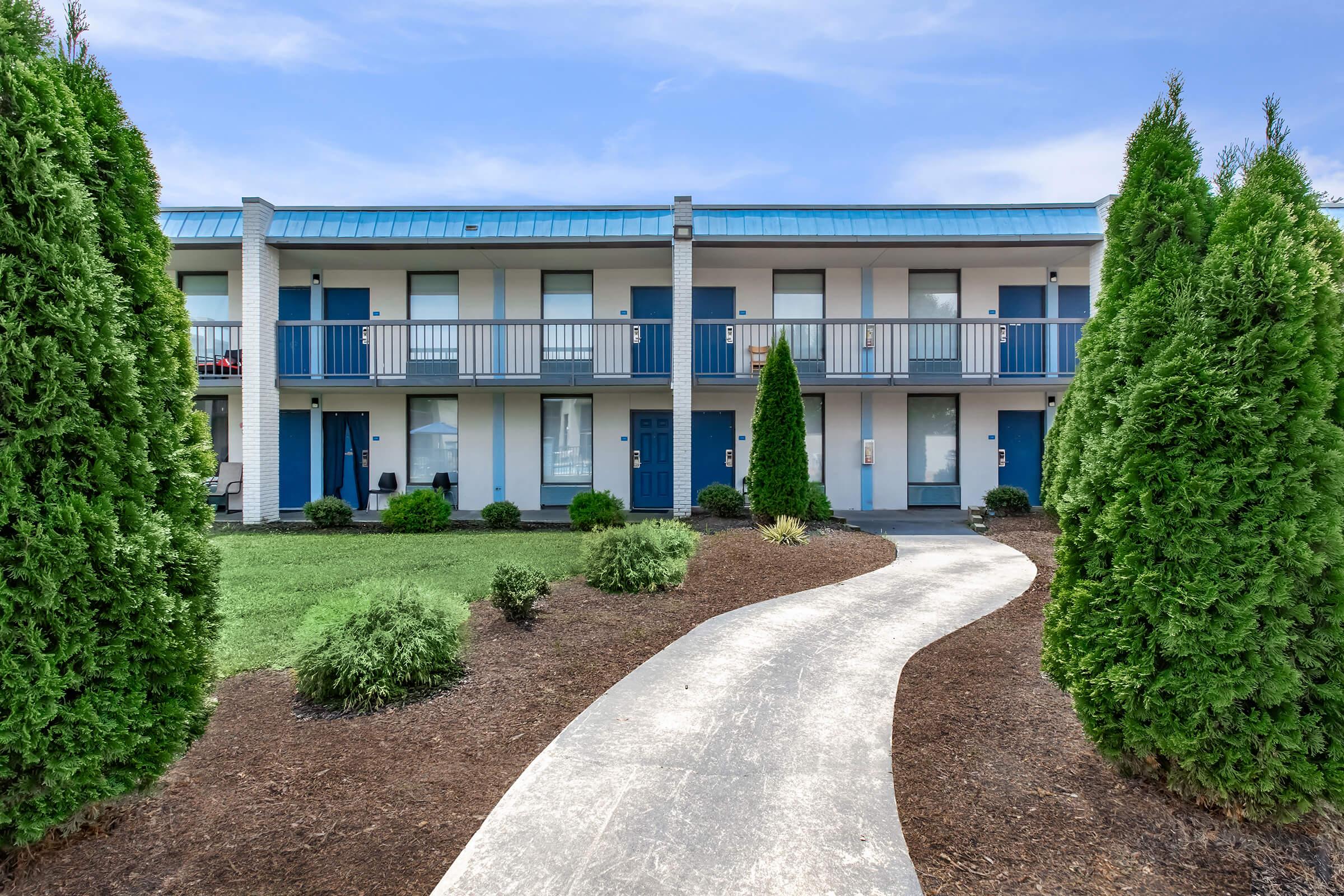 a garden in front of a building