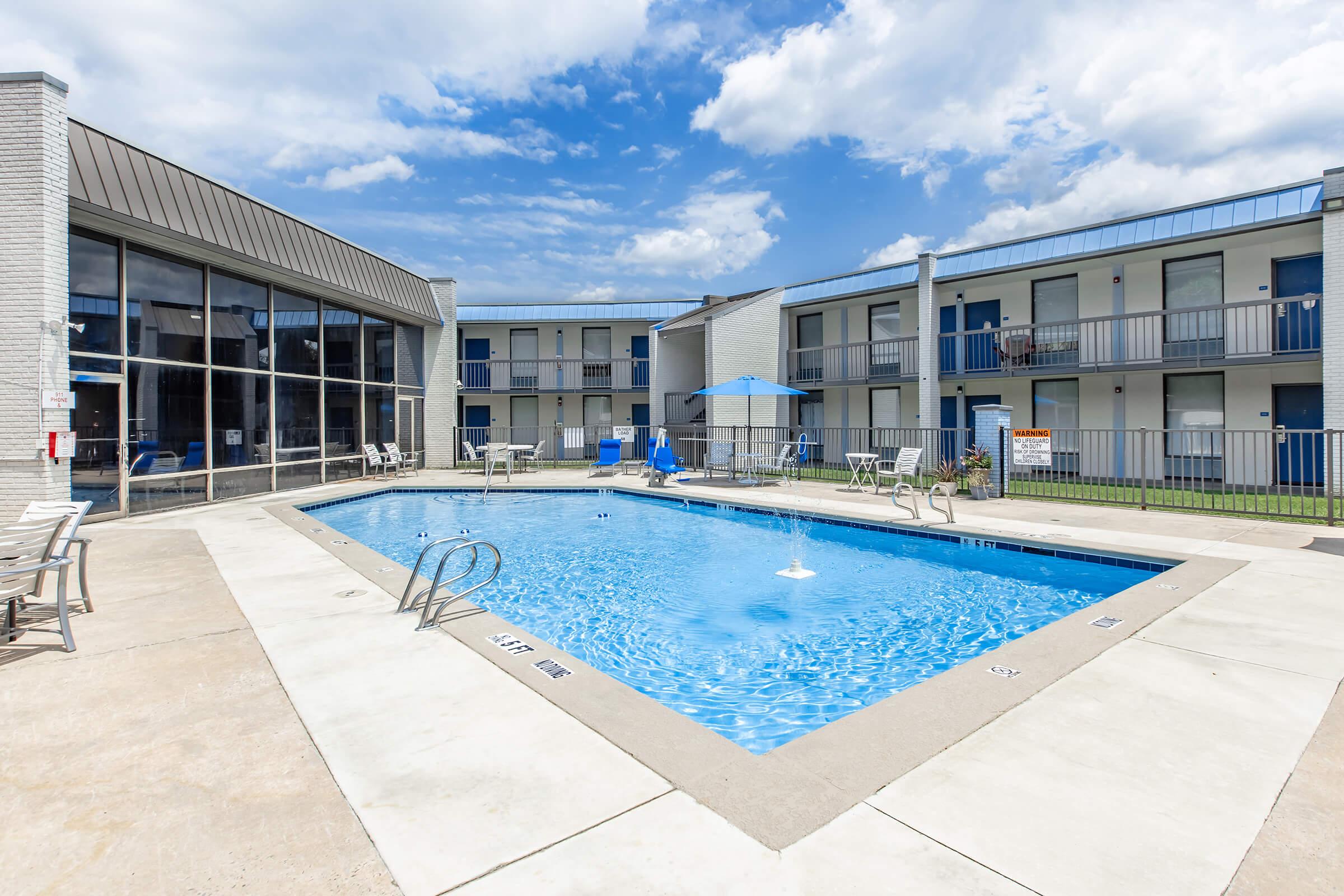 a pool next to a building