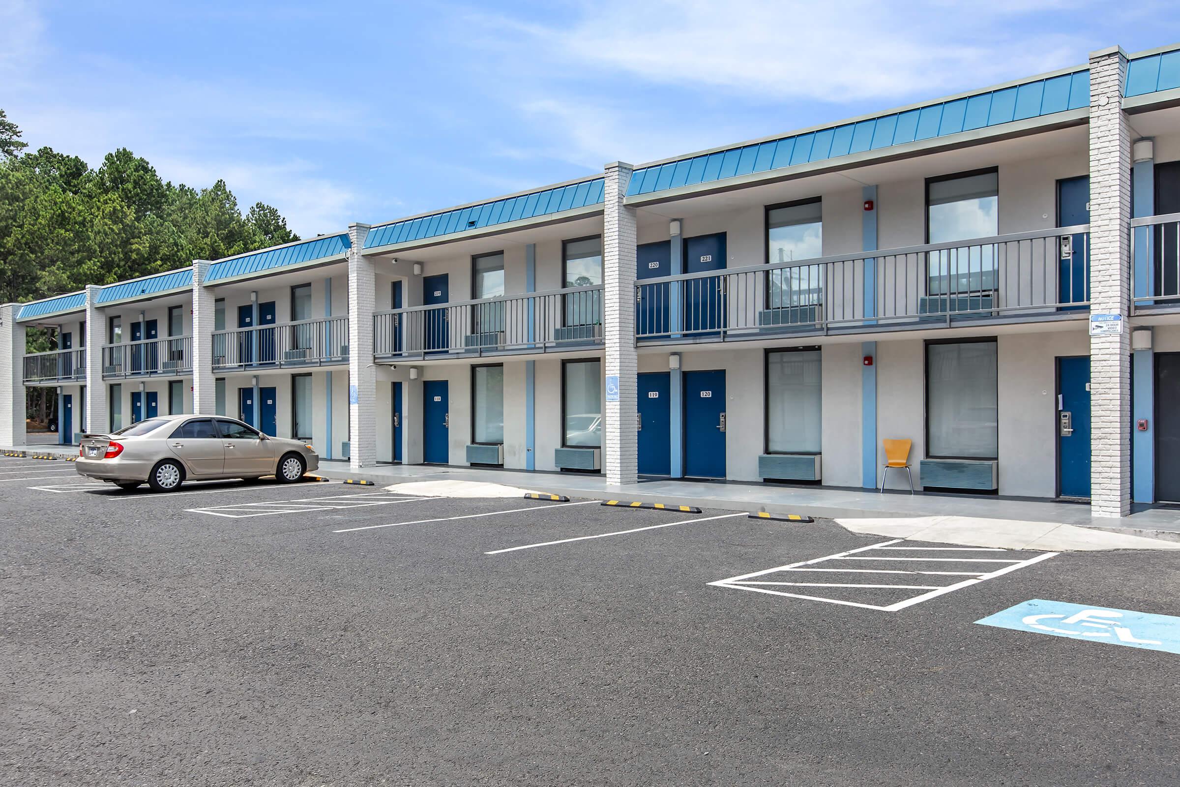 a building with a parking lot