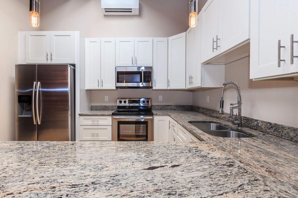 a kitchen with stainless steel appliances