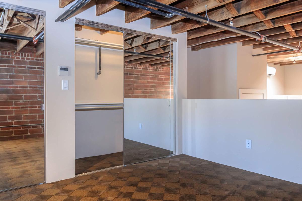 a kitchen with a building in the background