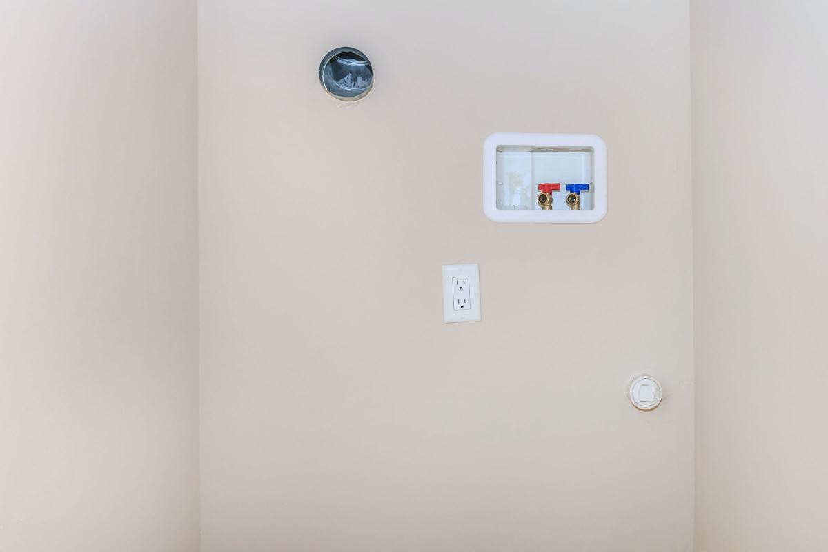 a white refrigerator freezer sitting in a room