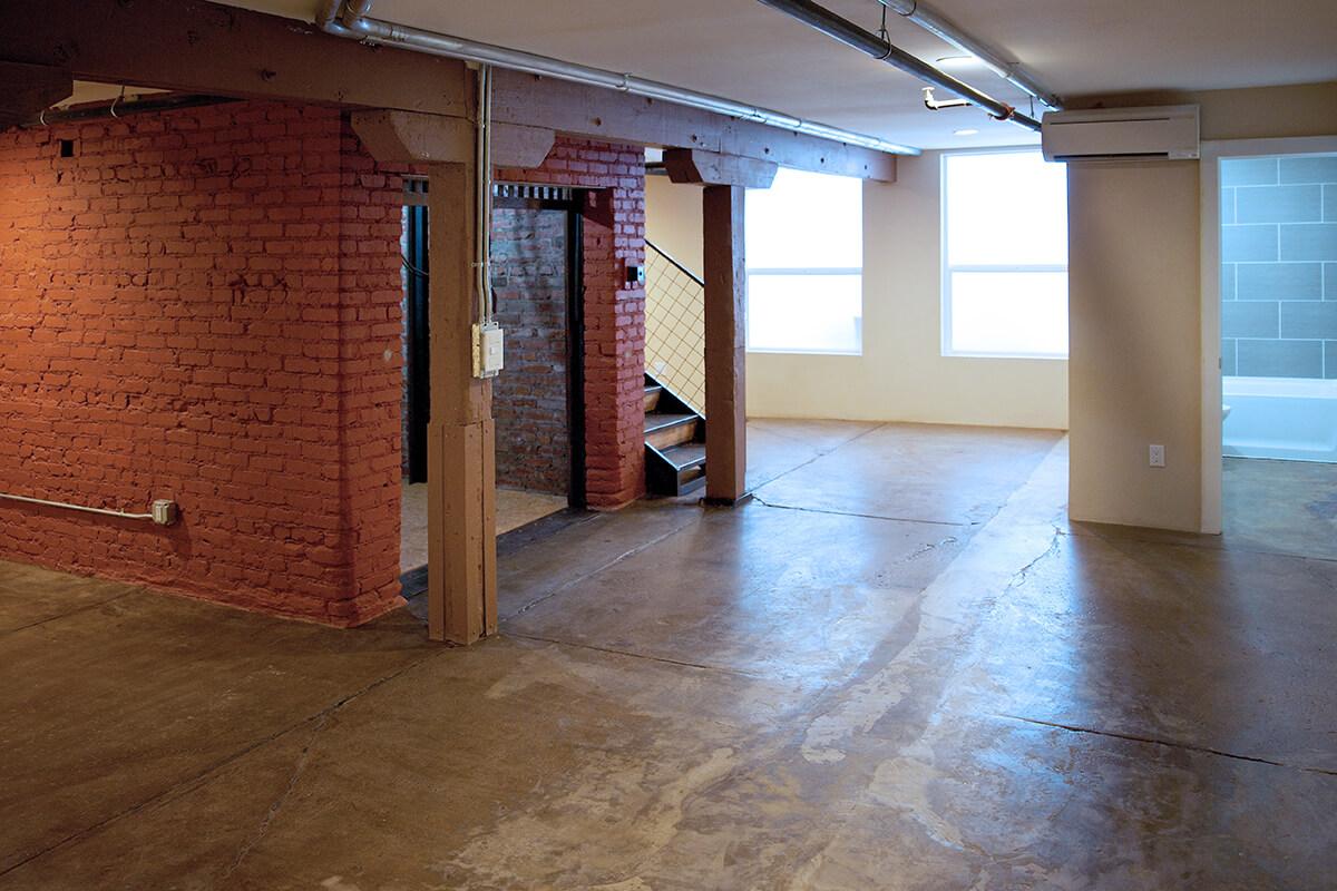 a large brick building with a wooden floor