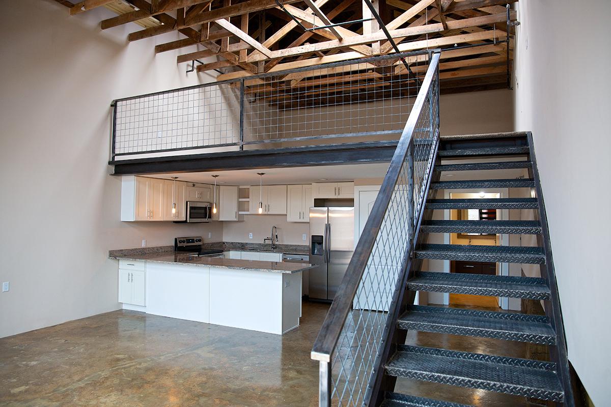 a stove top oven sitting inside of a building