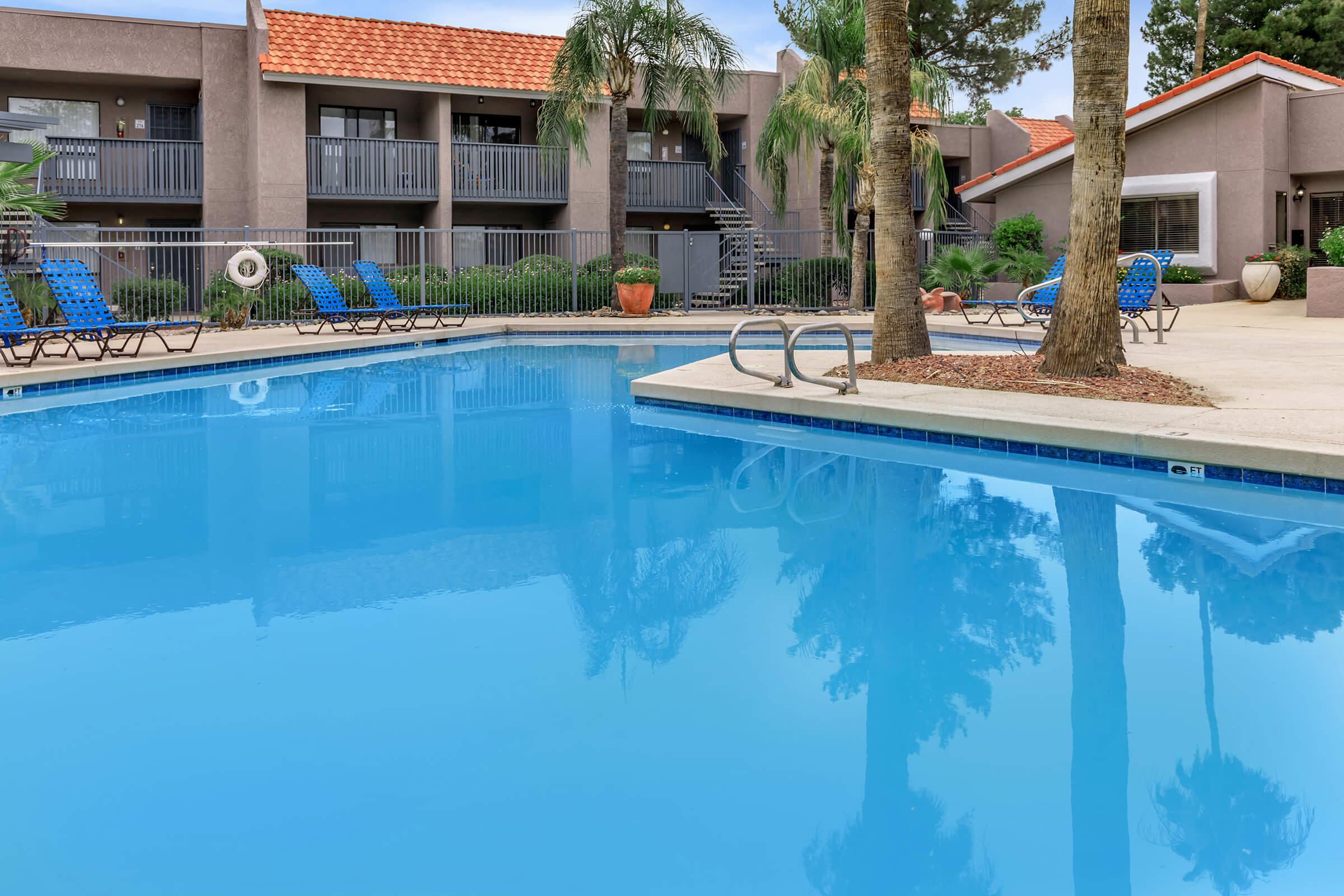 a large pool of water in front of a building