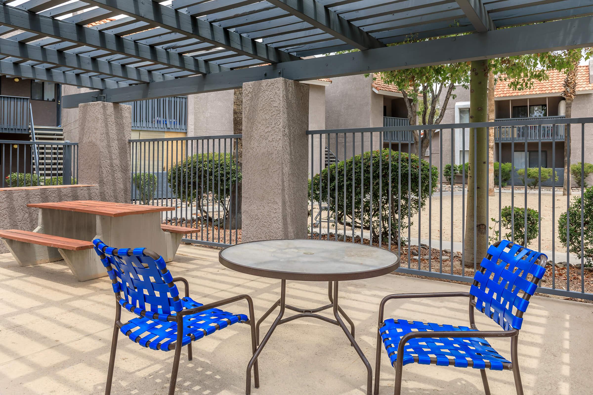 a chair sitting in front of a building