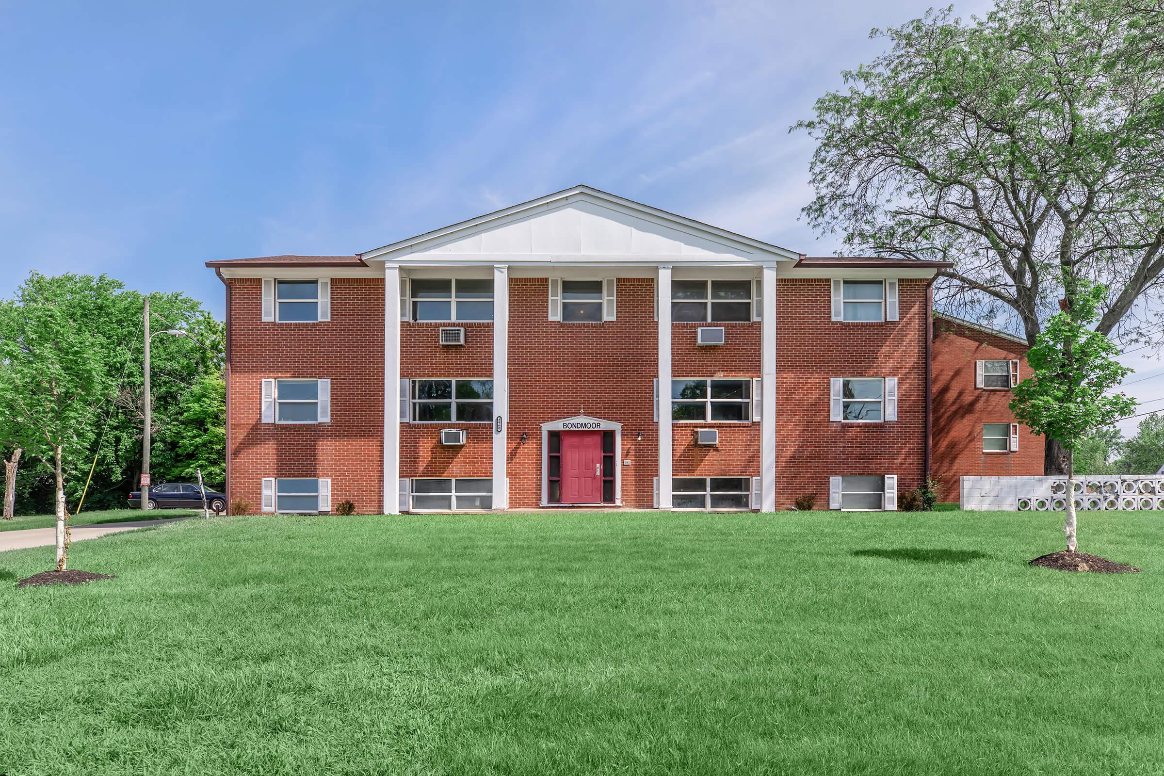 a large lawn in front of a house