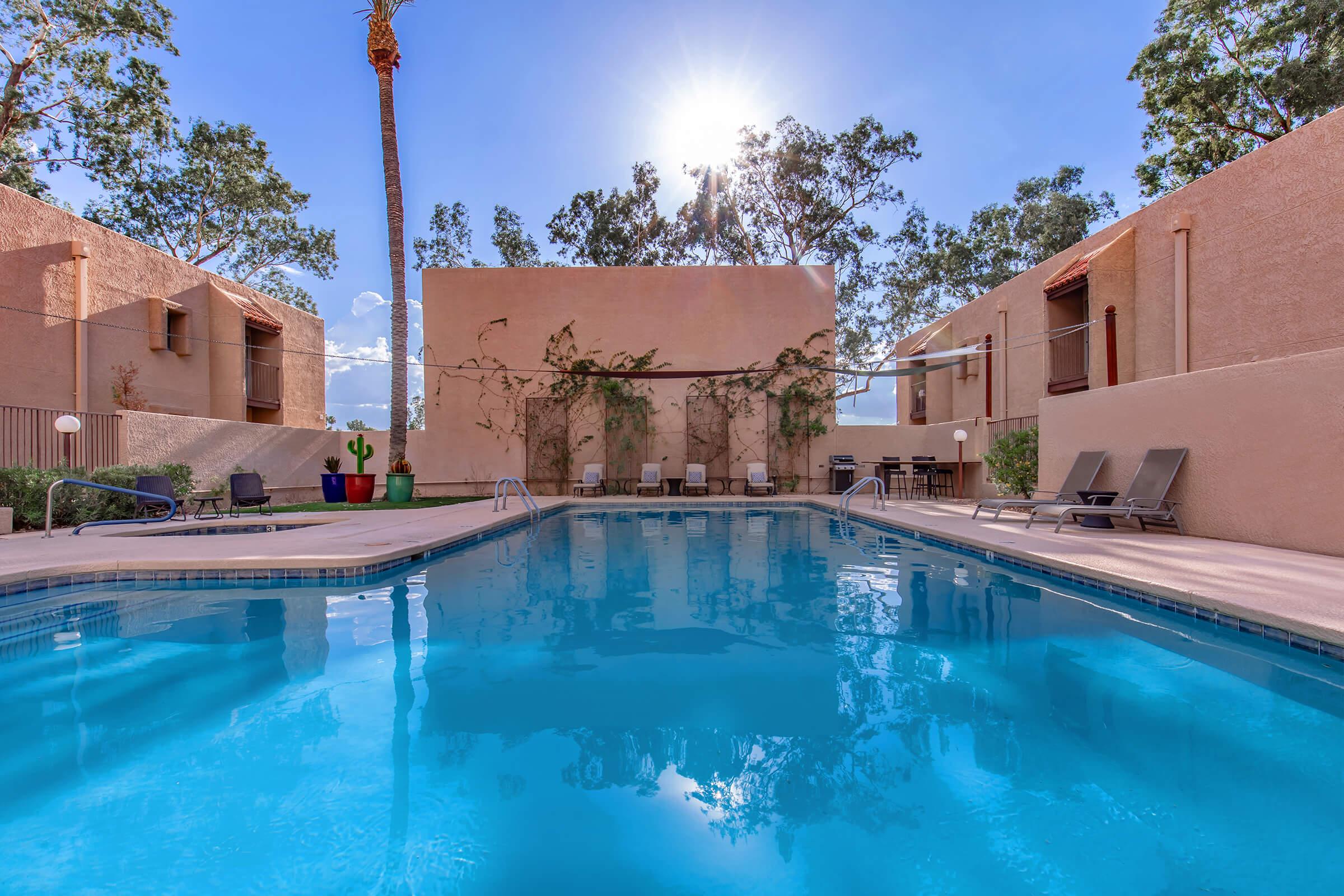 a house with a large pool of water