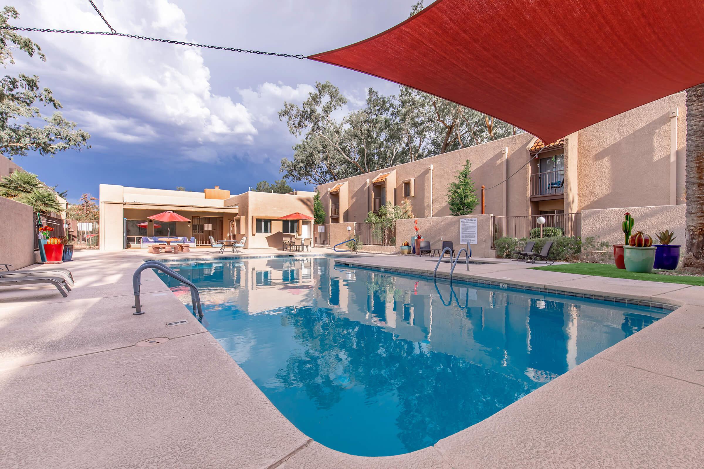 a pool next to a building