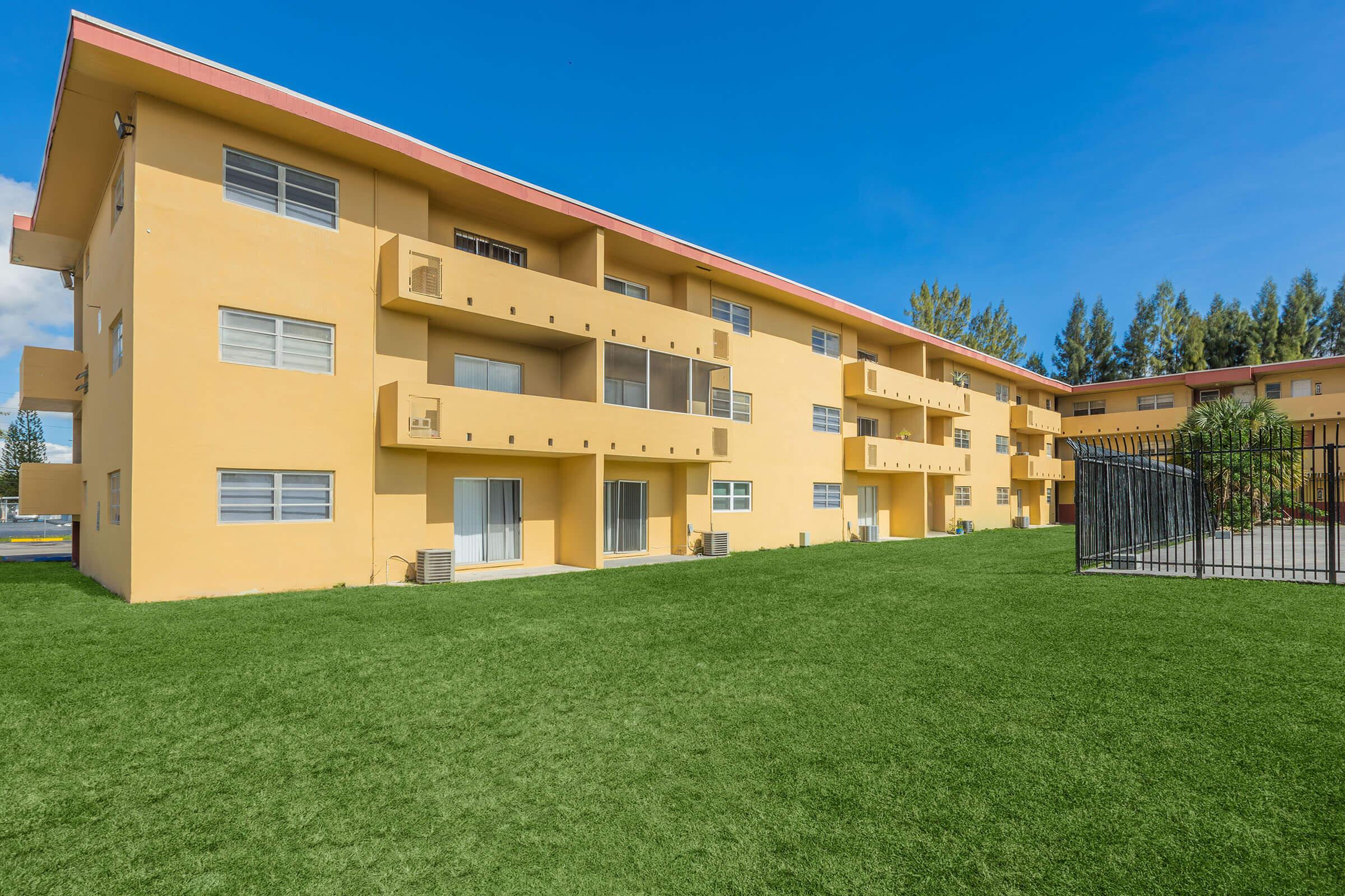 a large lawn in front of a house