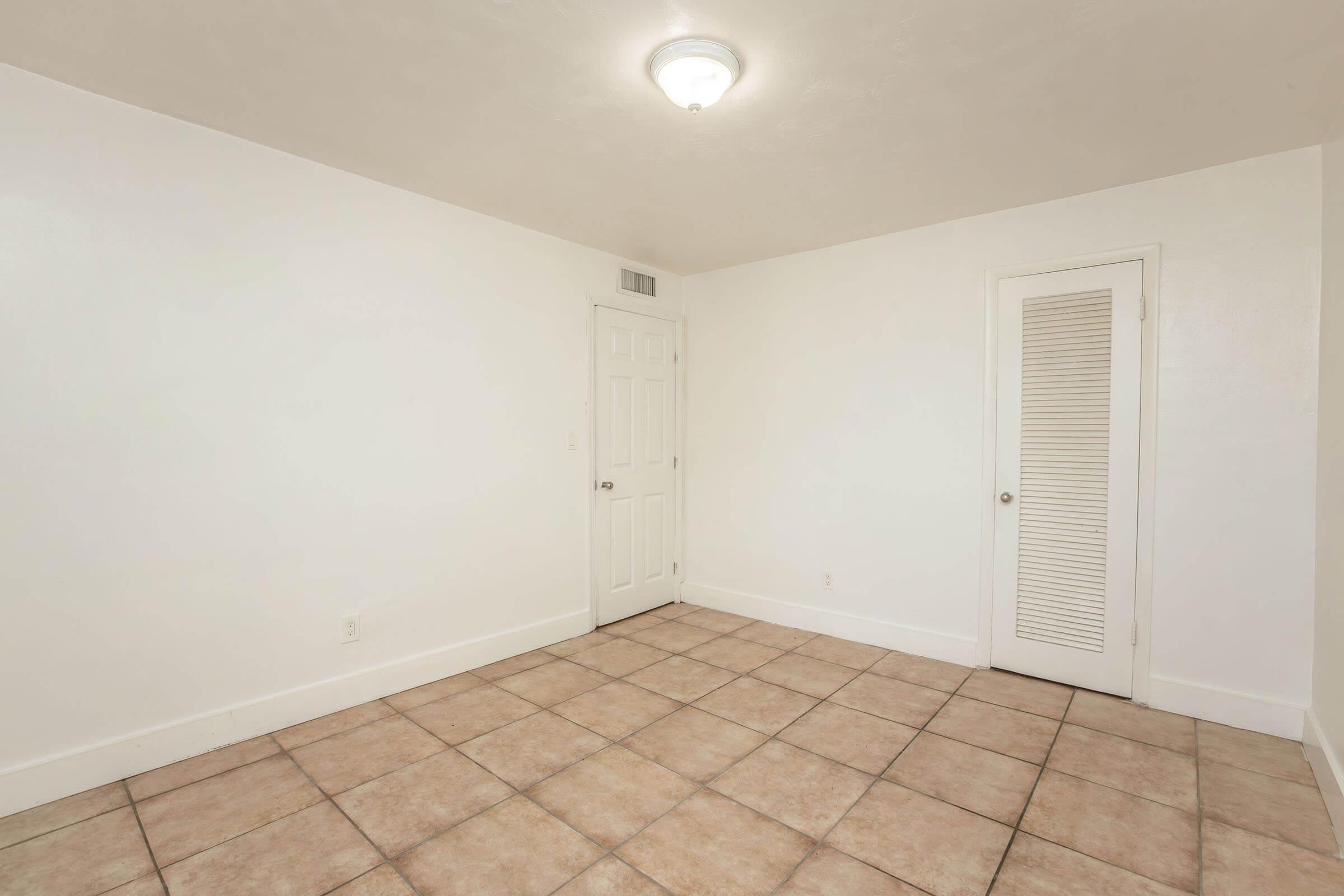 a room with a tiled floor