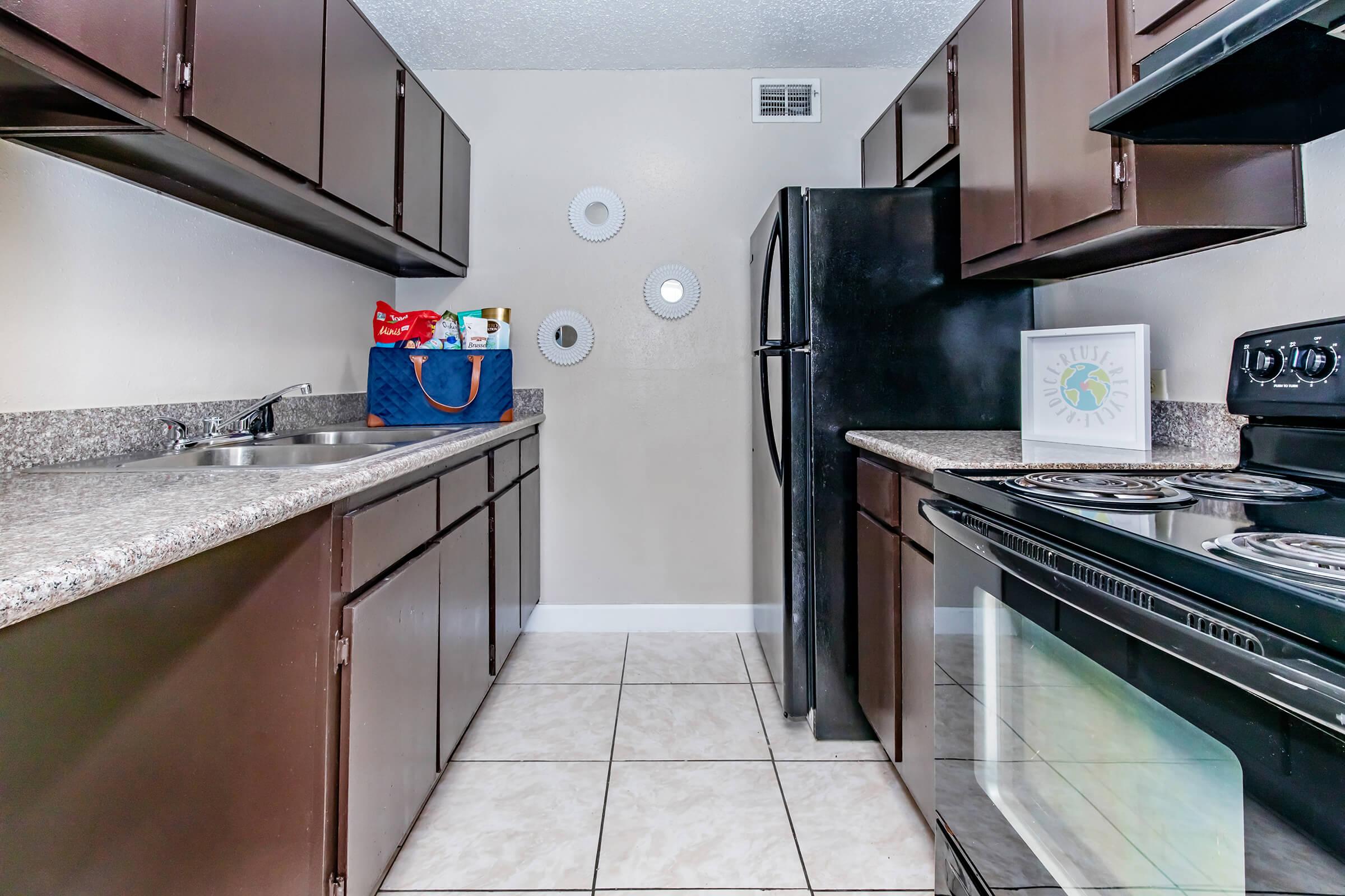 a modern kitchen with stainless steel appliances