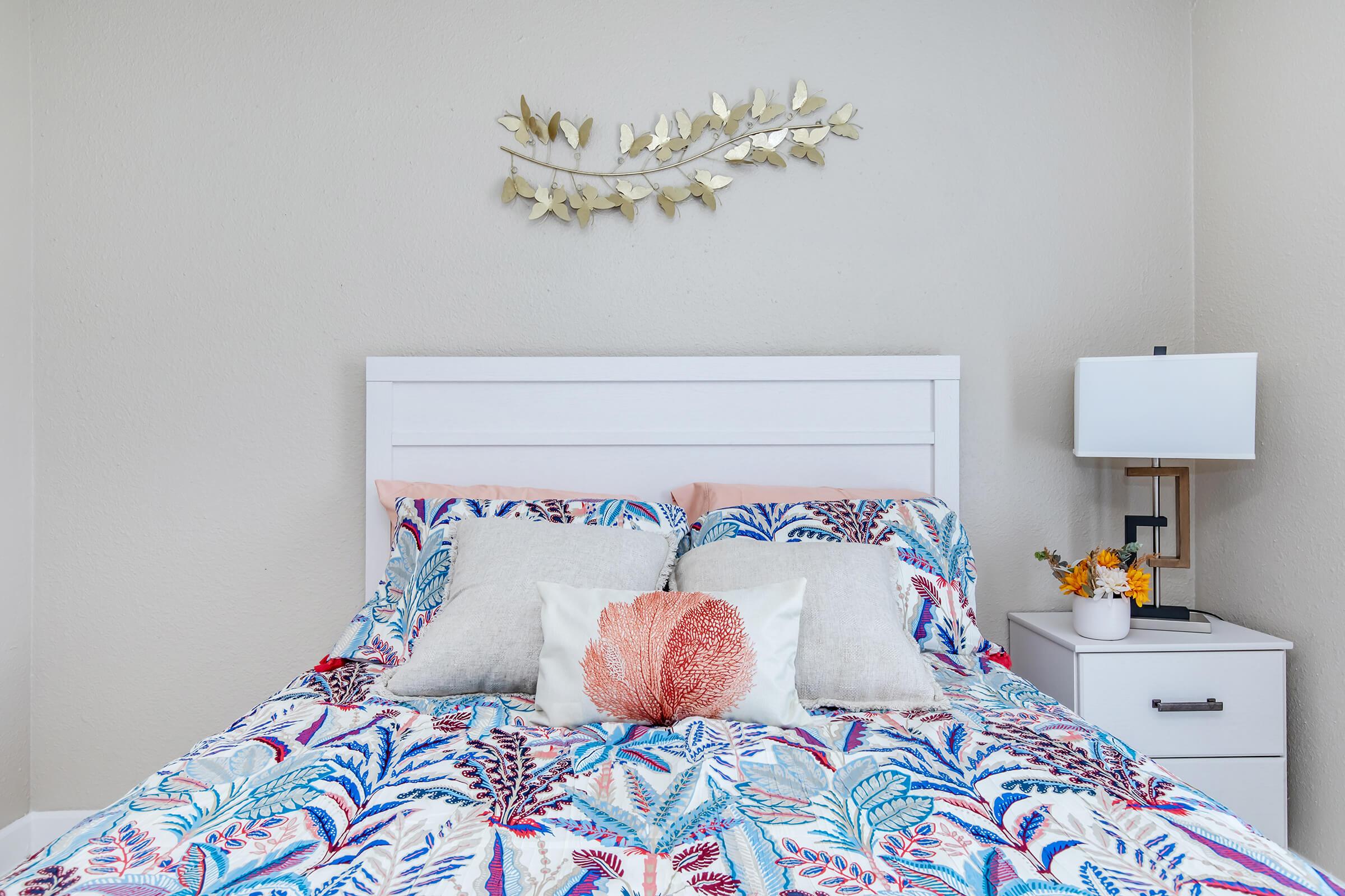 a bedroom with a stuffed animal