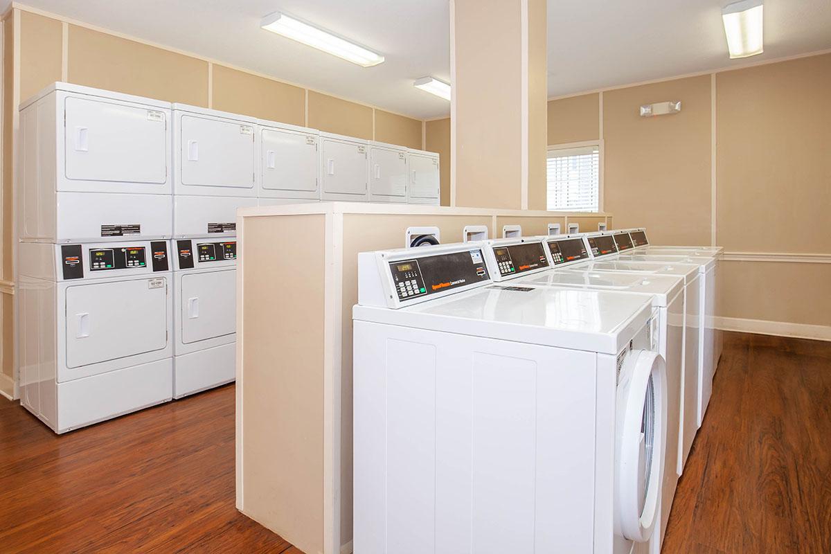 a white refrigerator freezer sitting inside of a kitchen