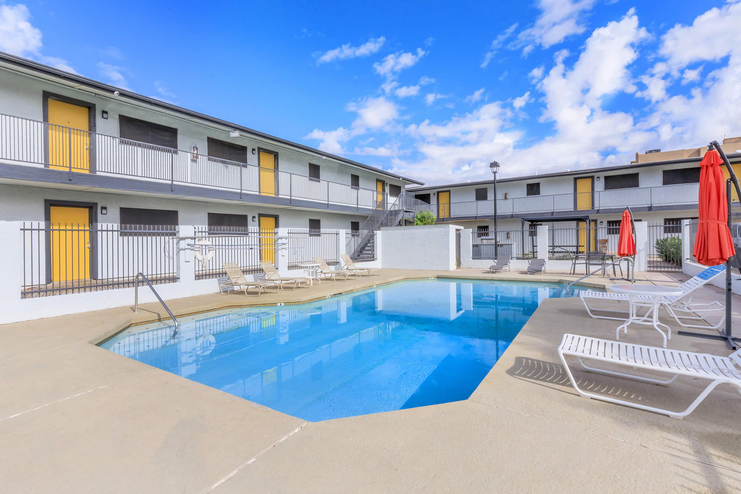 a pool next to a building