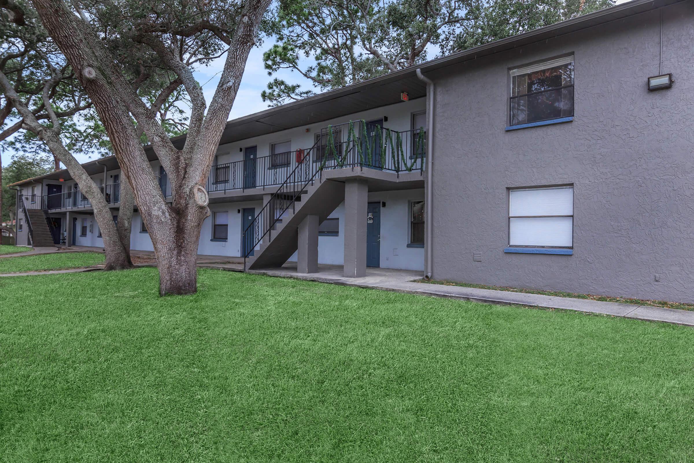 a large lawn in front of a house